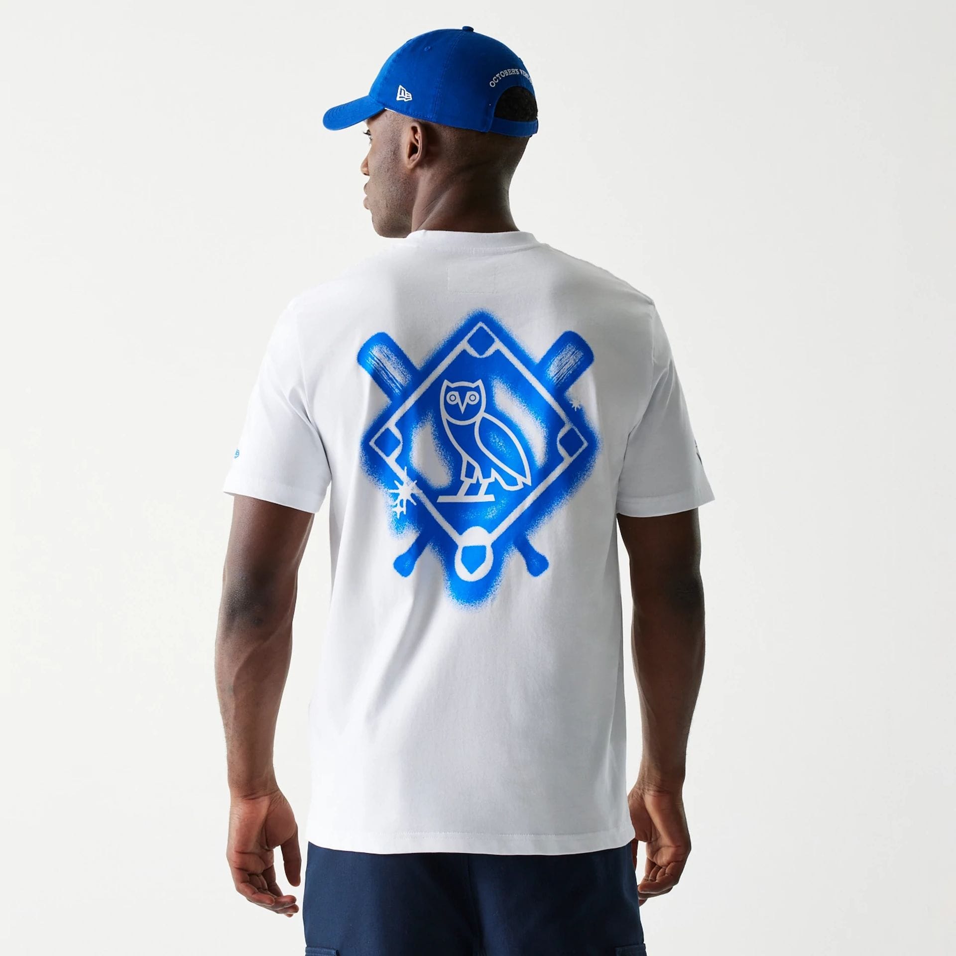 The Male model is wearing Toronto Blue Jays OVO x MLB White T-Shirt 2