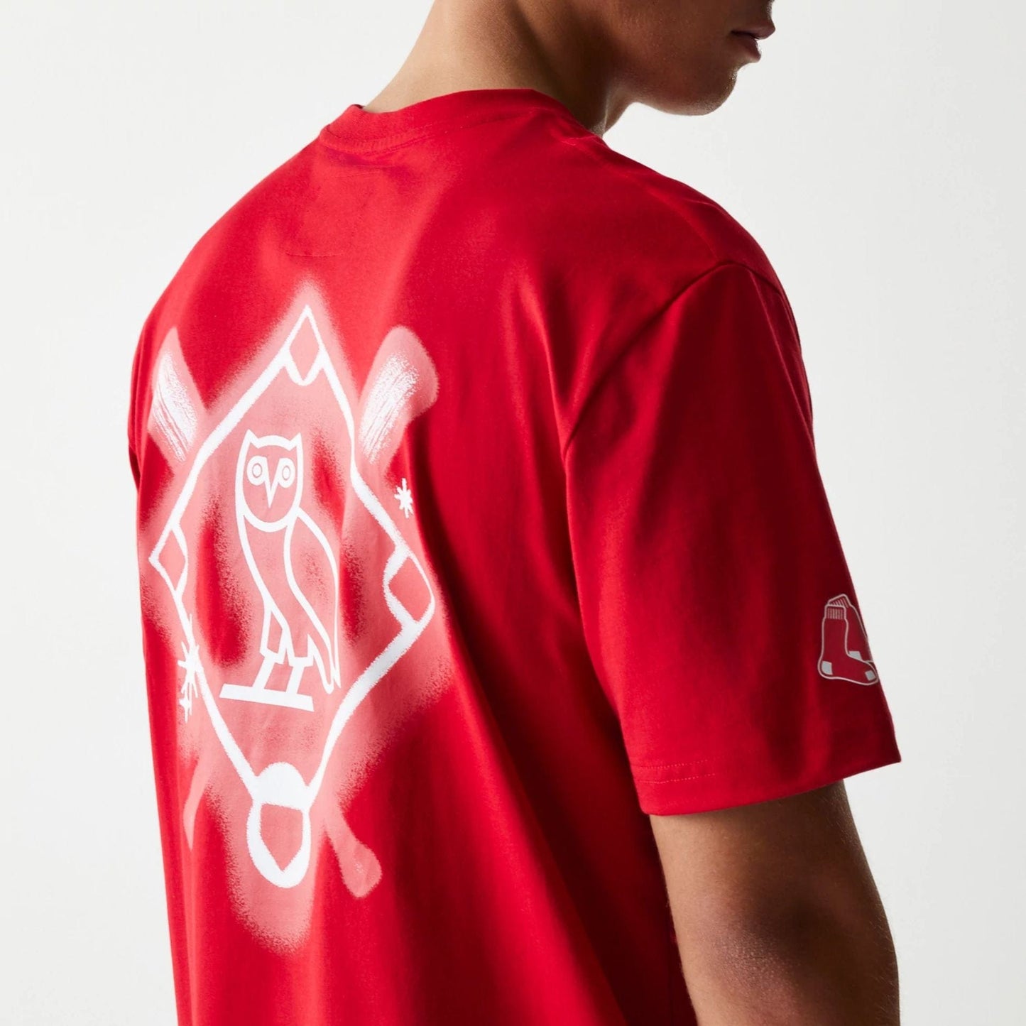 The Male model is wearing Boston Red Sox OVO x MLB Red T-Shirt 7