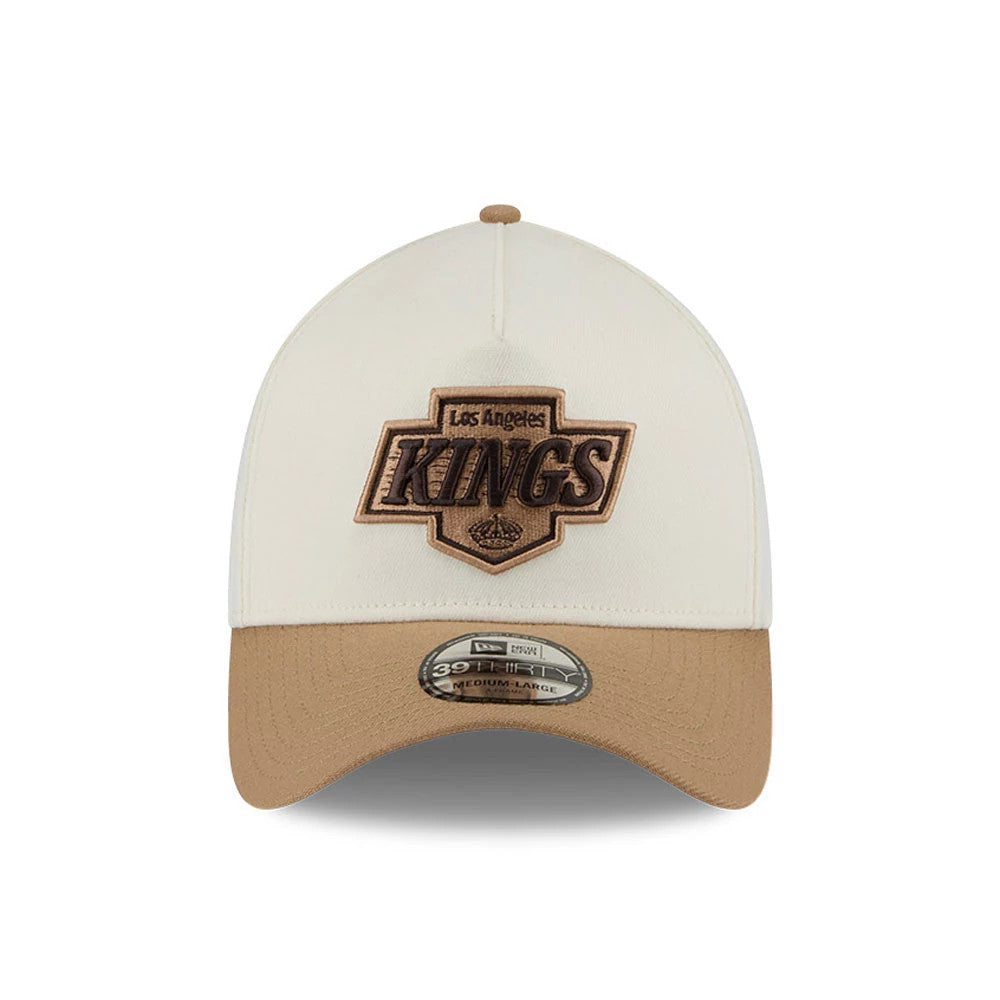 LA Kings NHL Sandy Bay White New Era 39THIRTY A-Frame Stretch Fit Cap, front view showing a brown embroidered Kings logo on the white structured crown, a brown curved visor, and a 39THIRTY size sticker.