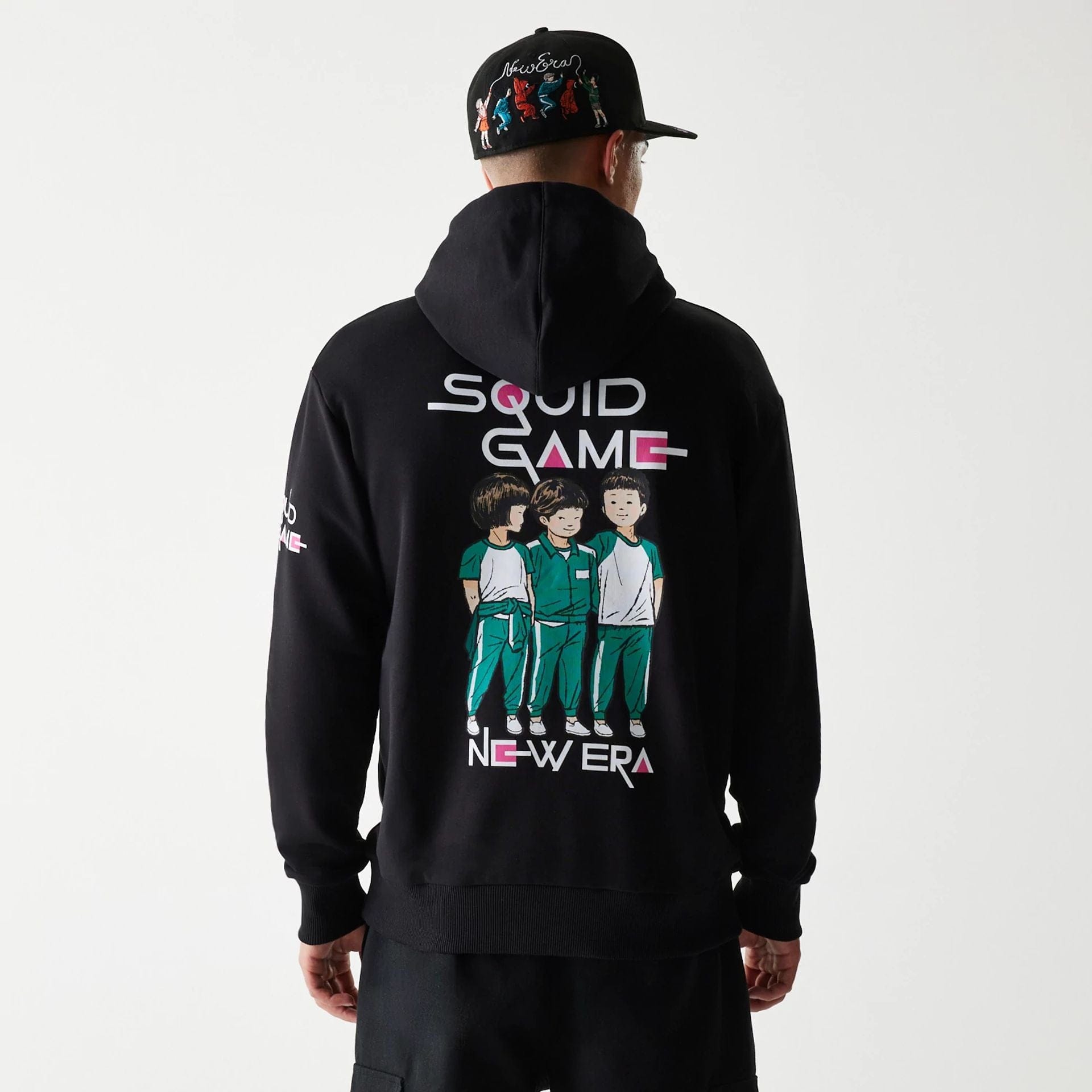 The Male model is wearing Netflix Squid Game Black Oversized Pullover Hoodie 2