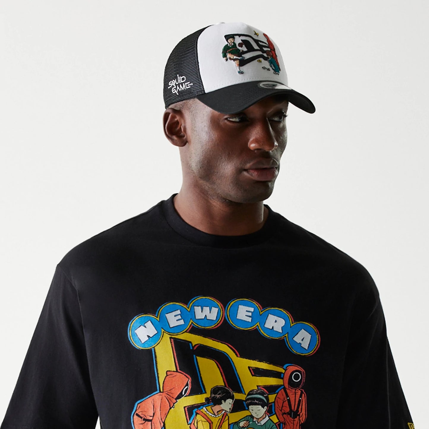 The Male model is wearing Netflix Squid Game Black Oversized T-Shirt 7