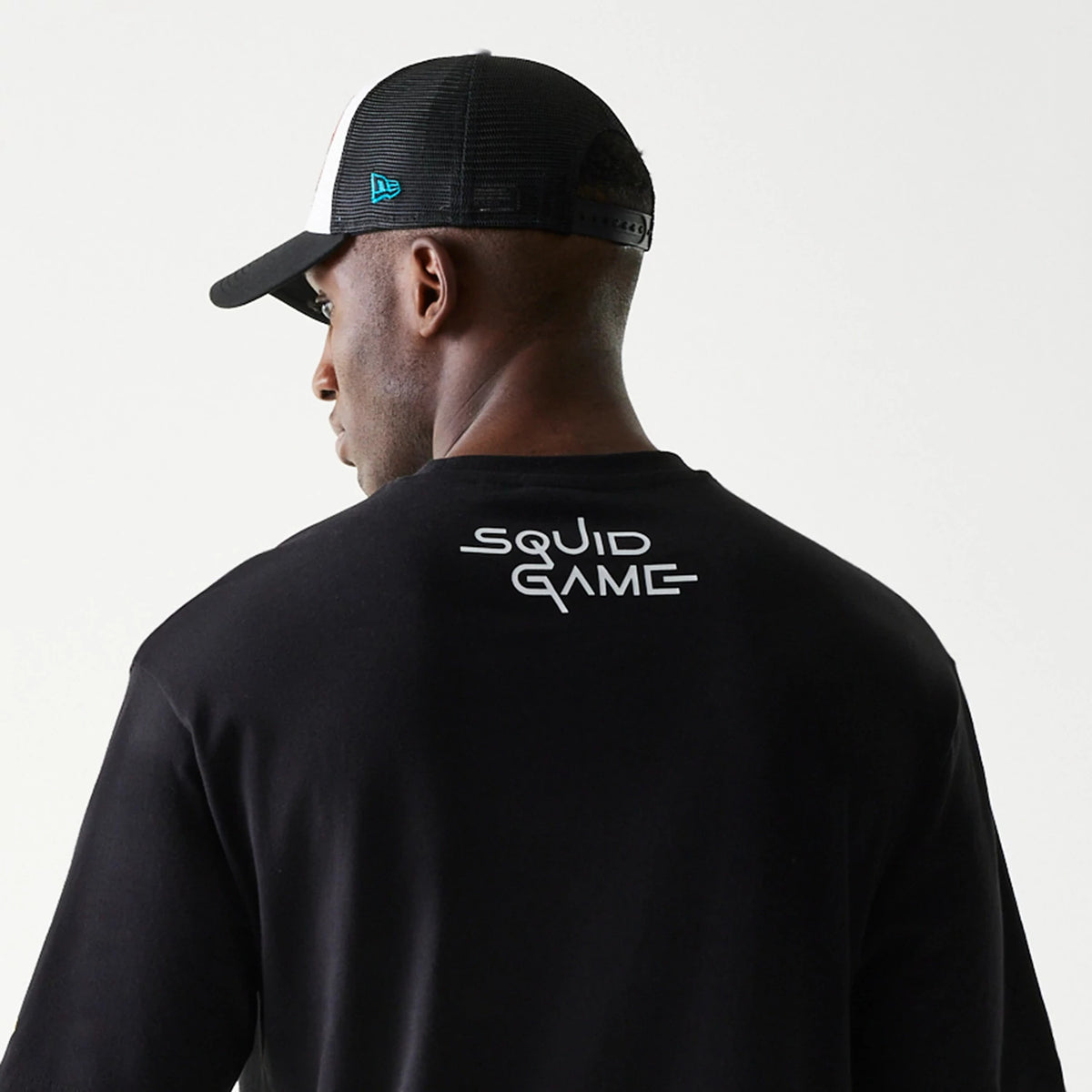 The Male model is wearing Netflix Squid Game Black Oversized T-Shirt 4