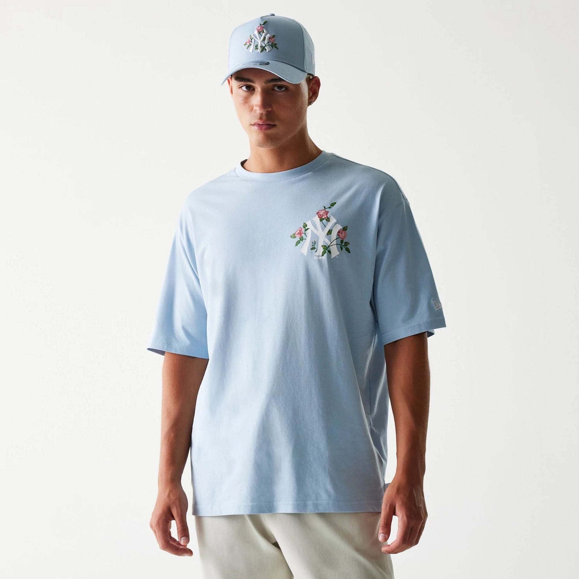 The Male model is wearing New York Yankees MLB Floral Pastel Blue Oversized T-Shirt 1
