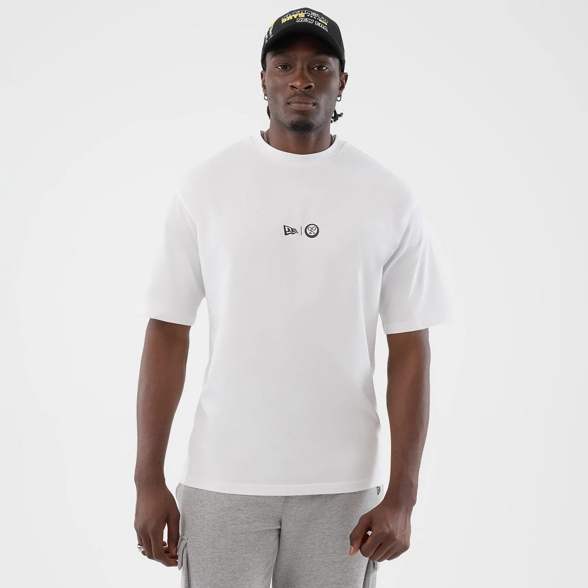 The Male model is wearing Sakamoto Days Icon Netflix White T-Shirt 1
