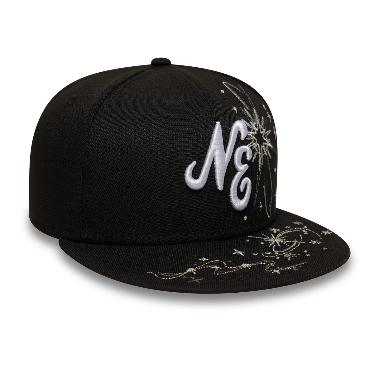 New Era Zodiac Black 59FIFTY Fitted Cap, three-quarter view showing raised white NE embroidery on the front panel, detailed zodiac-themed stitching in white and silver on the side, and across the black flat visor.