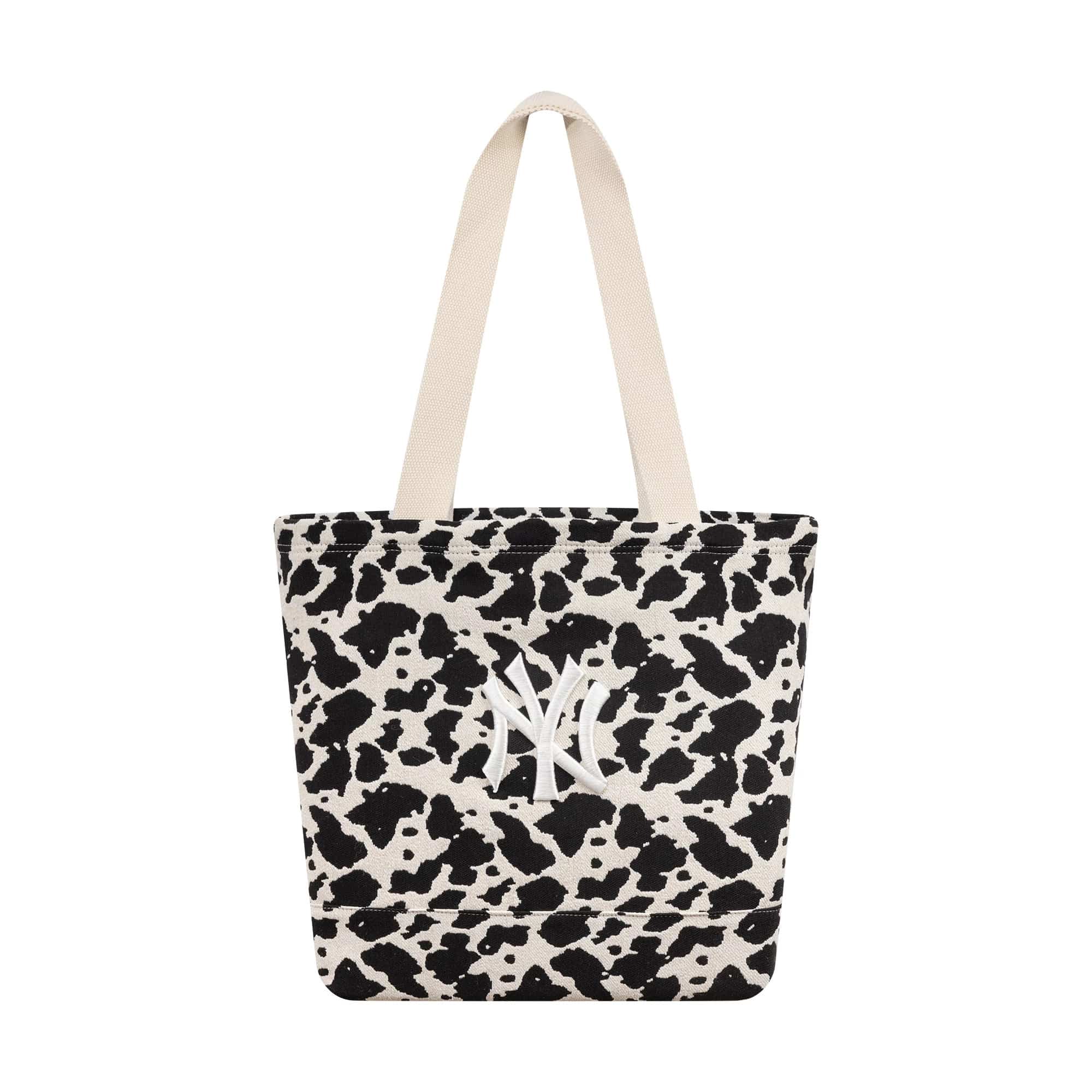 Pictured is this MLB Cow Jacquard New York Yankees Tote Bag in cream. 2