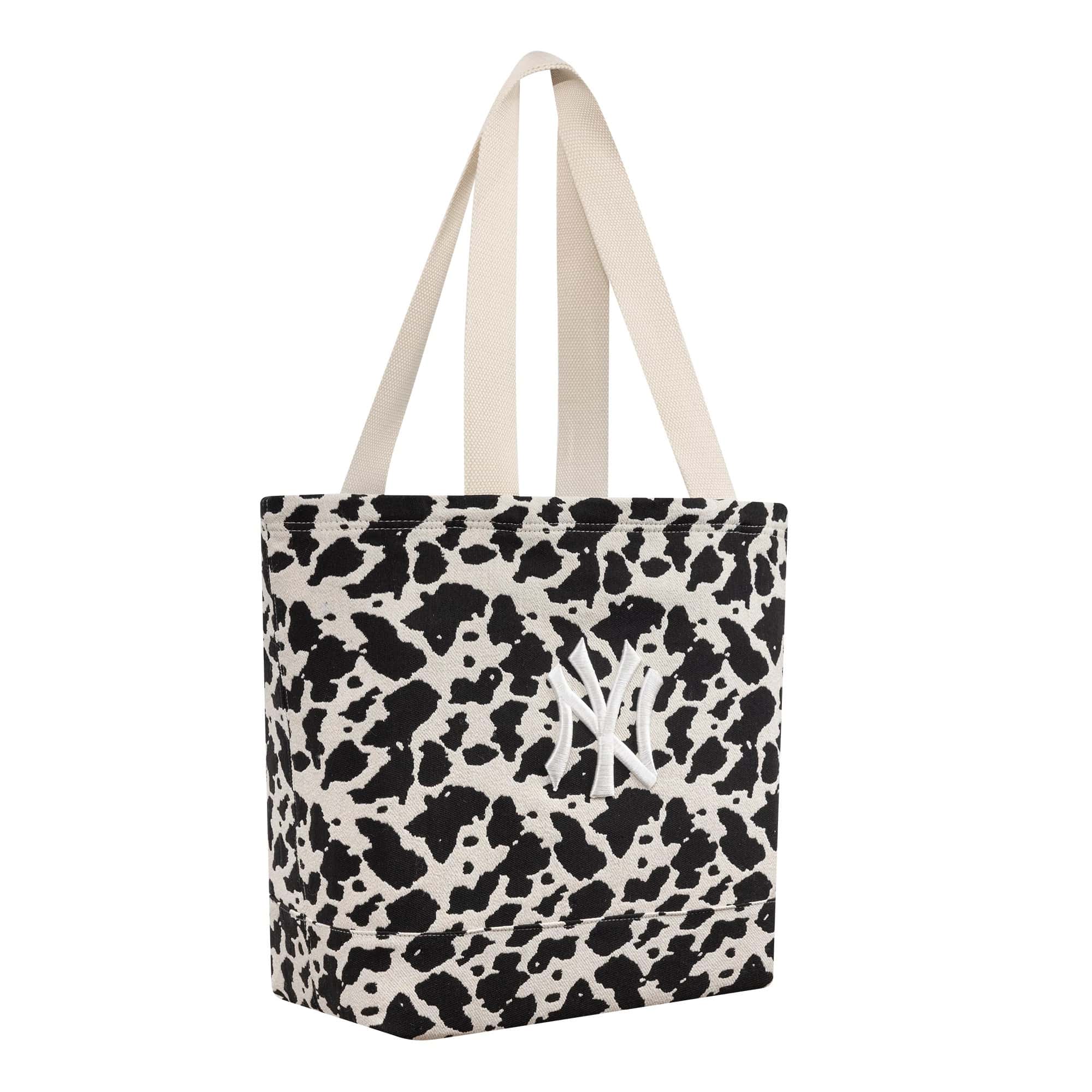 Pictured is this MLB Cow Jacquard New York Yankees Tote Bag in cream. 4