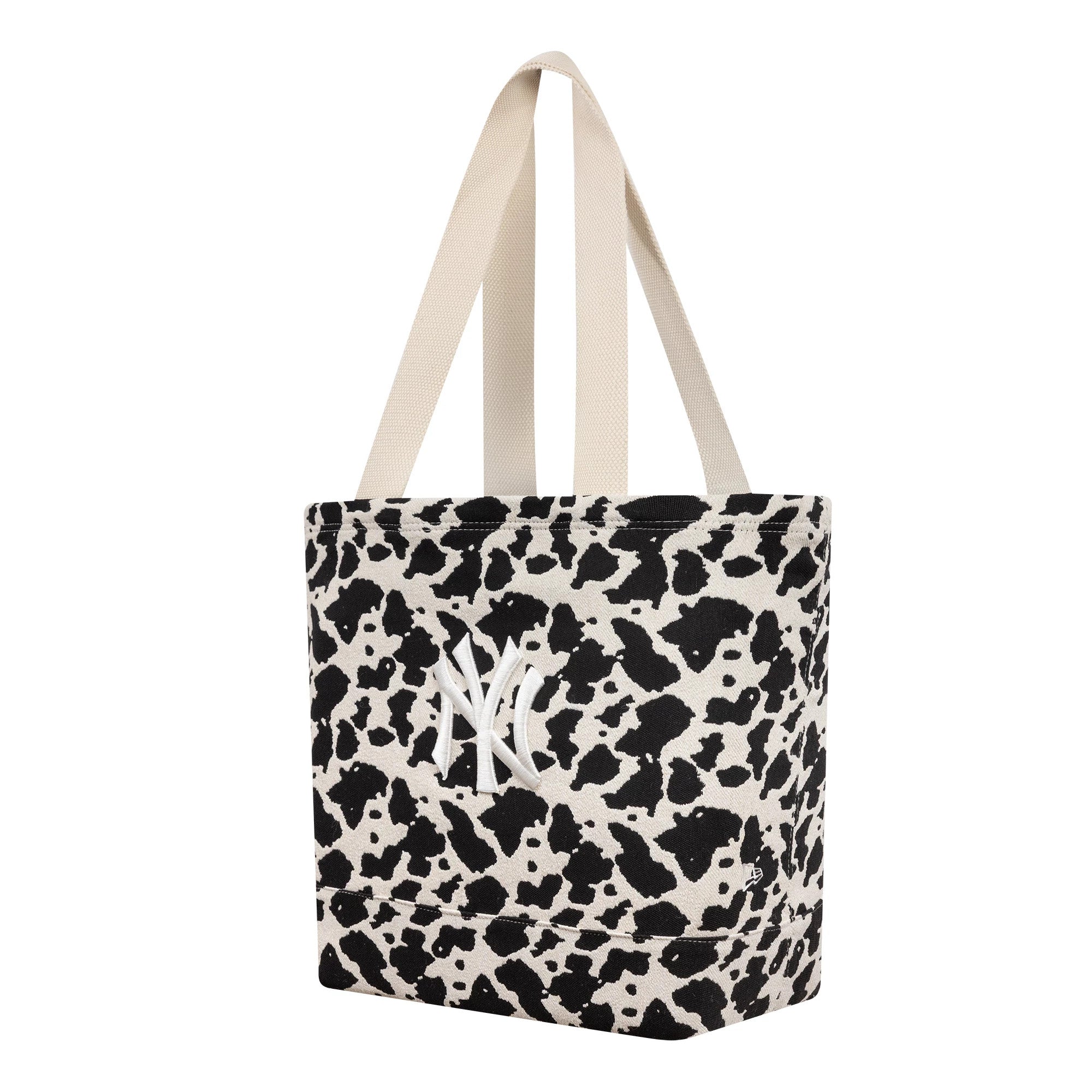Pictured is this MLB Cow Jacquard New York Yankees Tote Bag in cream. 1