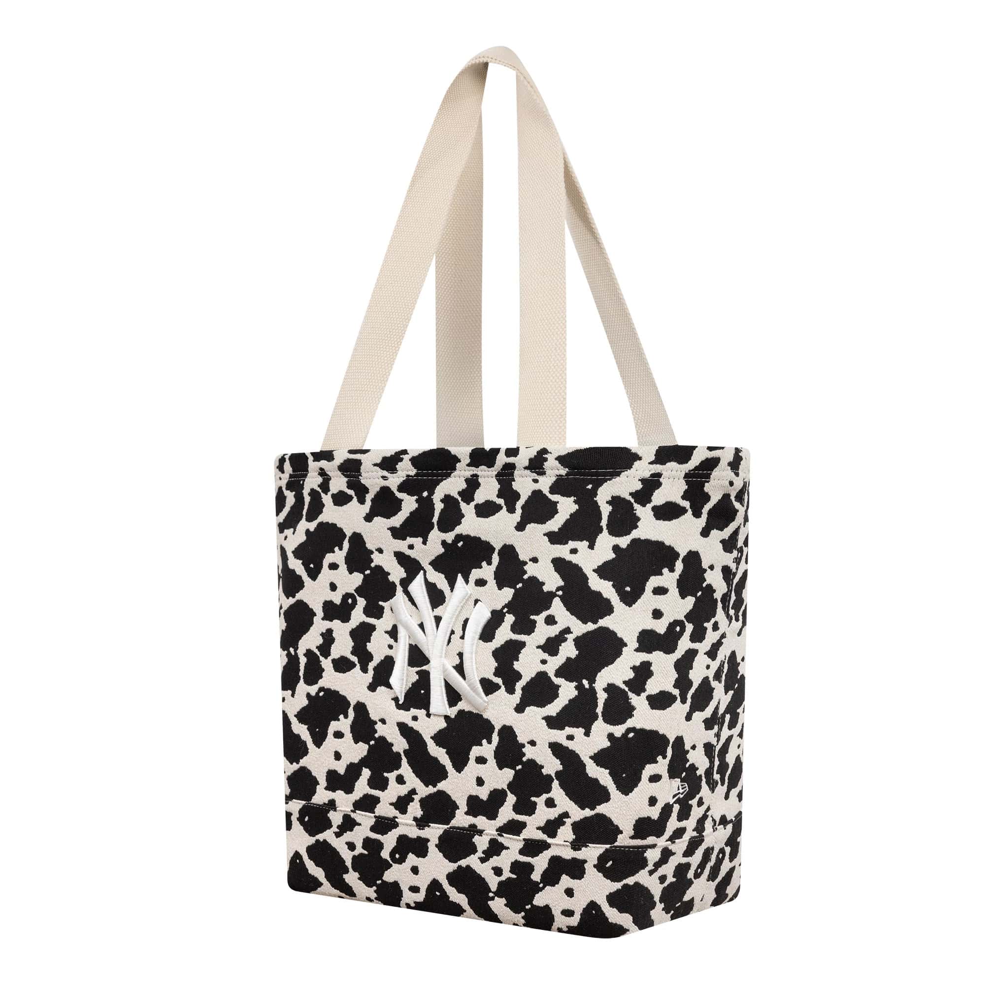Pictured is this MLB Cow Jacquard New York Yankees Tote Bag in cream. 1