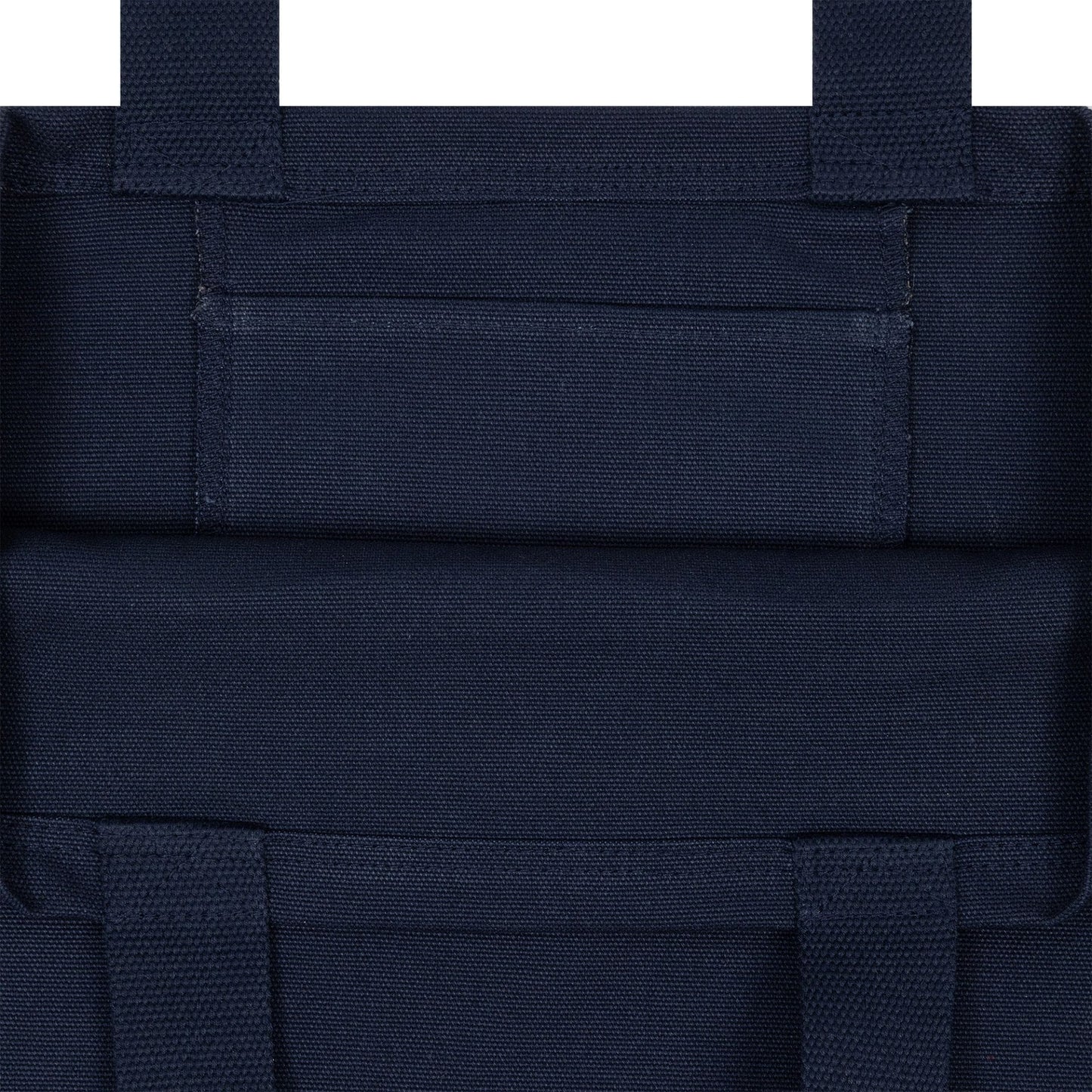 New Era New York Yankees MLB Fruit Navy Tote Bag, close-up view showing the navy fabric with stitching and detailed construction at the top section, featuring reinforced straps and a rectangular band across the upper part.