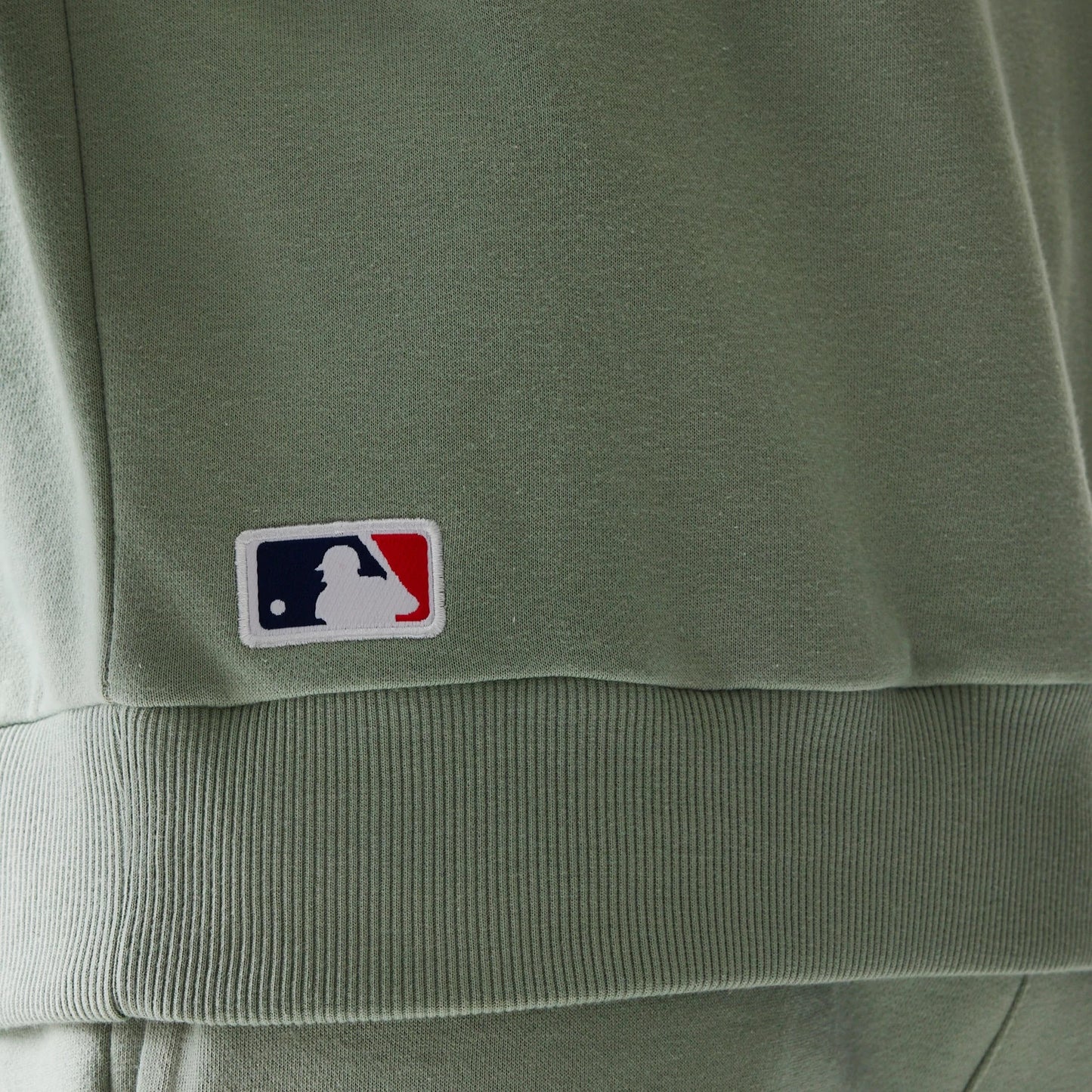 The model is wearing this MLB League Essential Midi LA Dodgers Oversized Crew Neck Sweater in pastel green. 8