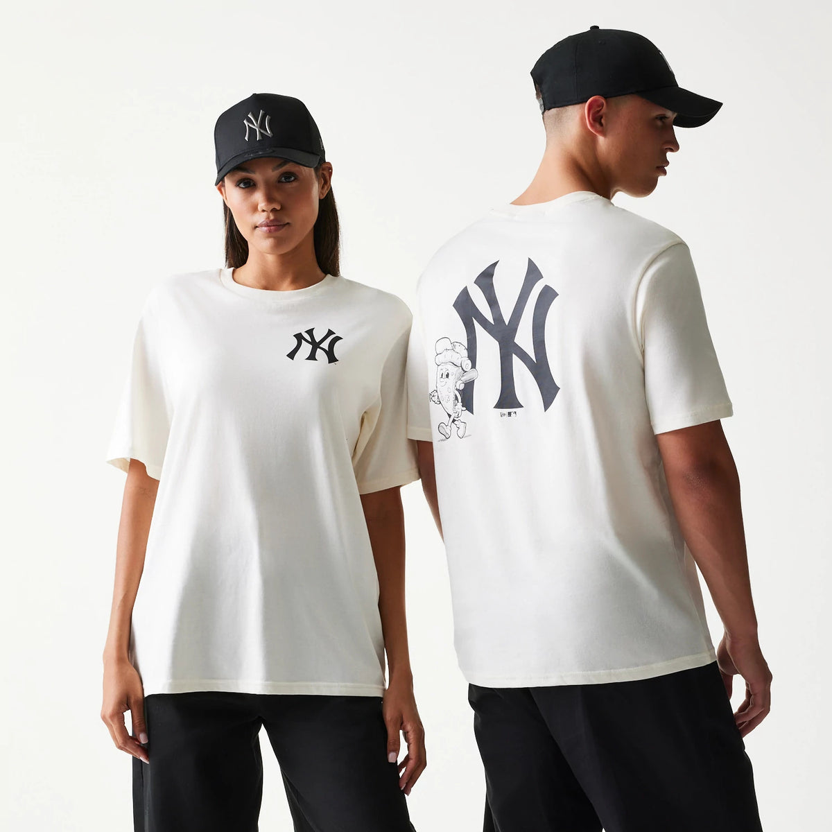 New Era New York Yankees MLB Food Graphic Open White T-Shirt, on-model view showing large black NY New York Yankees logo on the upper back with a food graphic and a smaller NY logo on the left chest, both models wearing black caps.