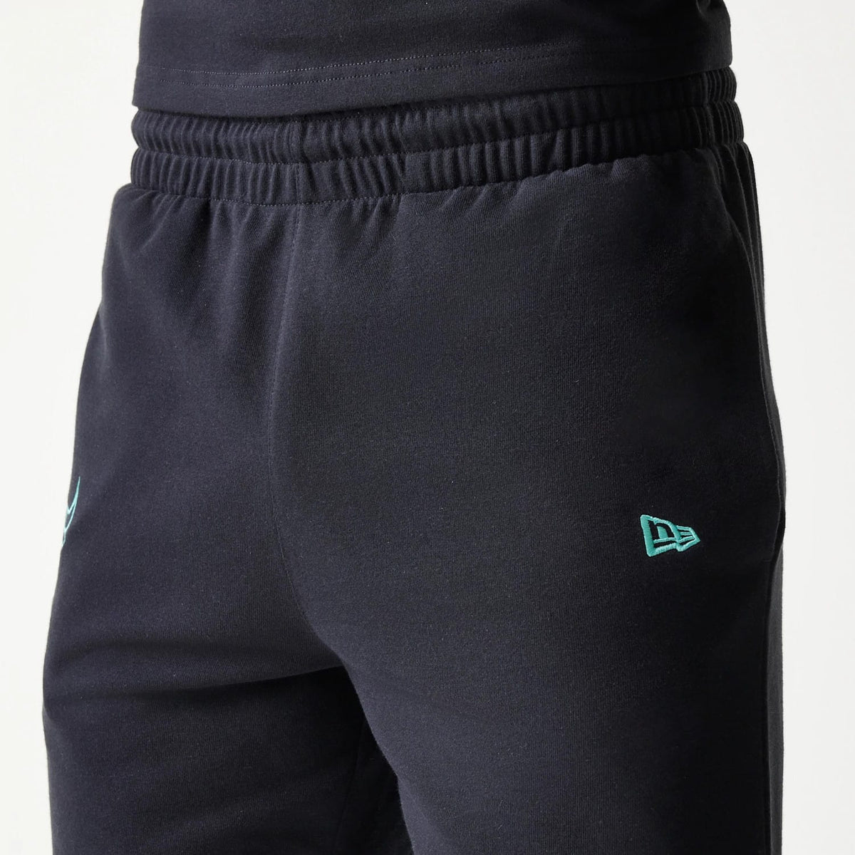 The model is wearing this NBA League Essential Chicago Bulls Shorts in black. 4