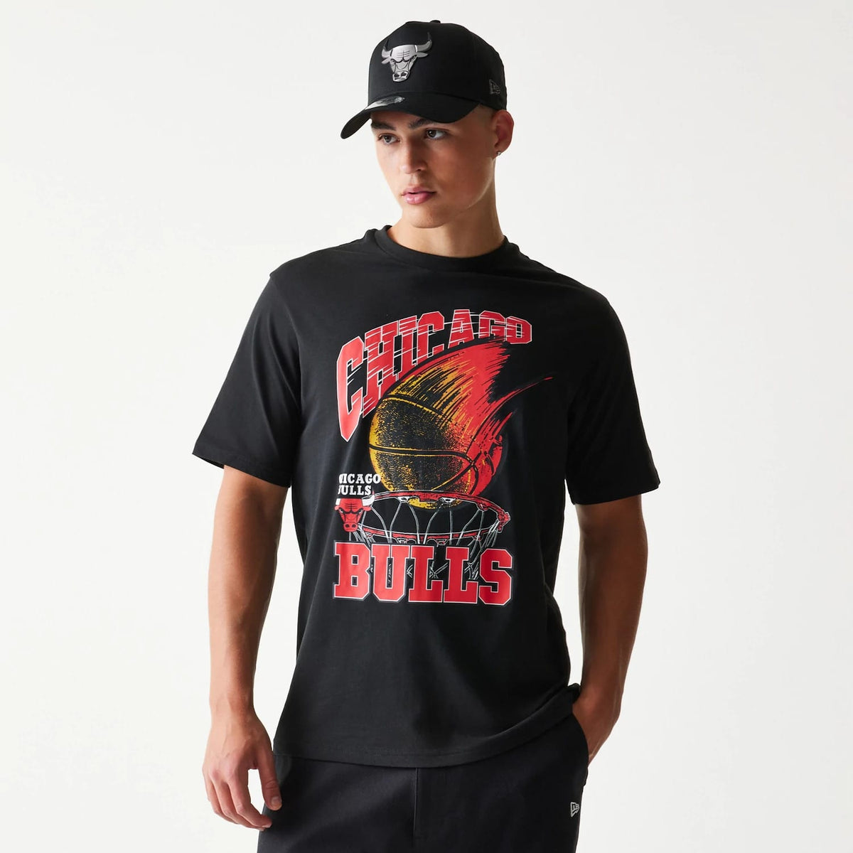 The model is wearing this NBA Ball Graphic Chicago Bulls T-Shirt in black. 3