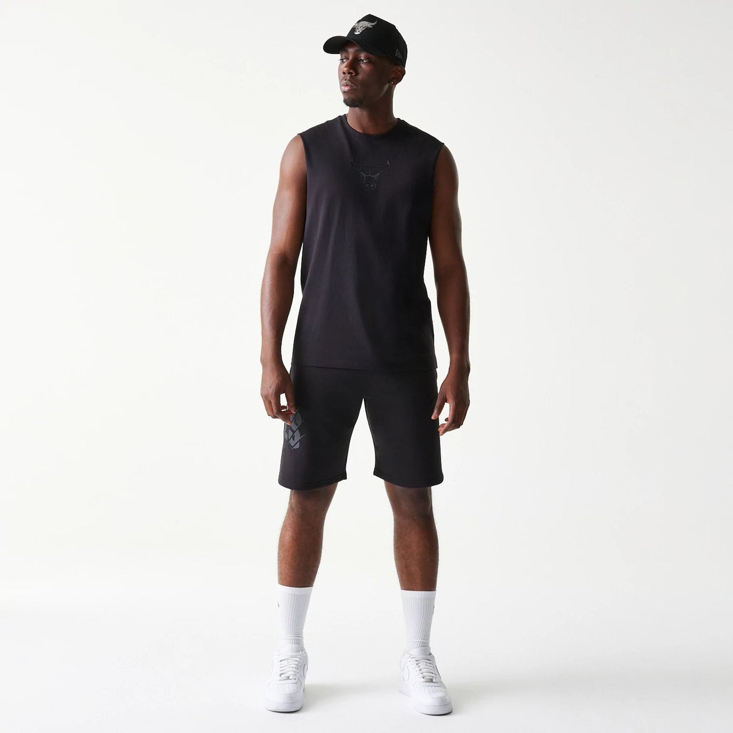 The model is wearing this NBA Chicago Bulls Sleeveless T-Shirt in black. 8