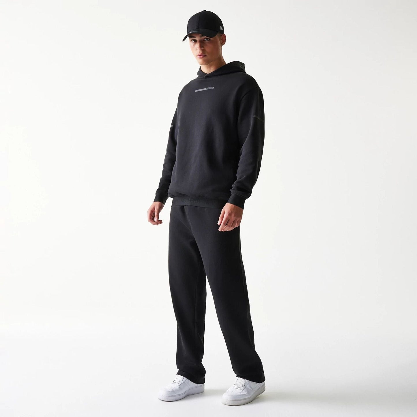 The model is wearing this New Era Tech Straight Leg Joggers in black. 8