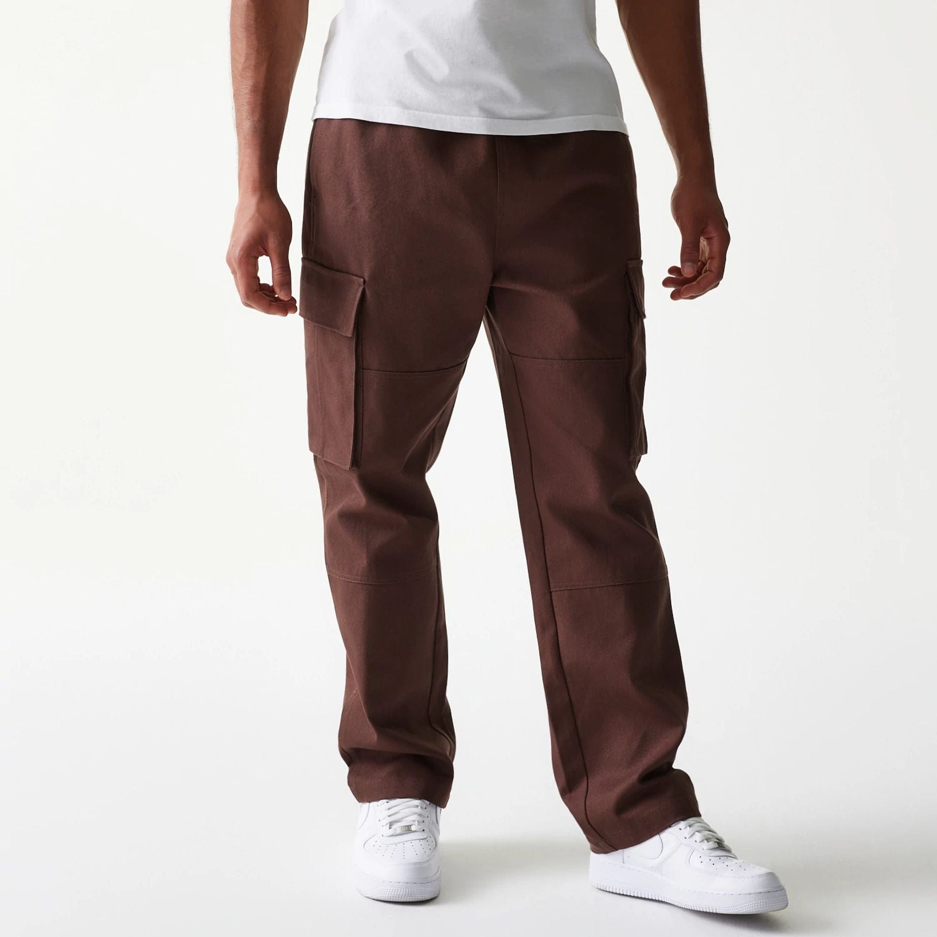 The model is wearing this New Era Straight Leg Cargo Joggers in brown. 1