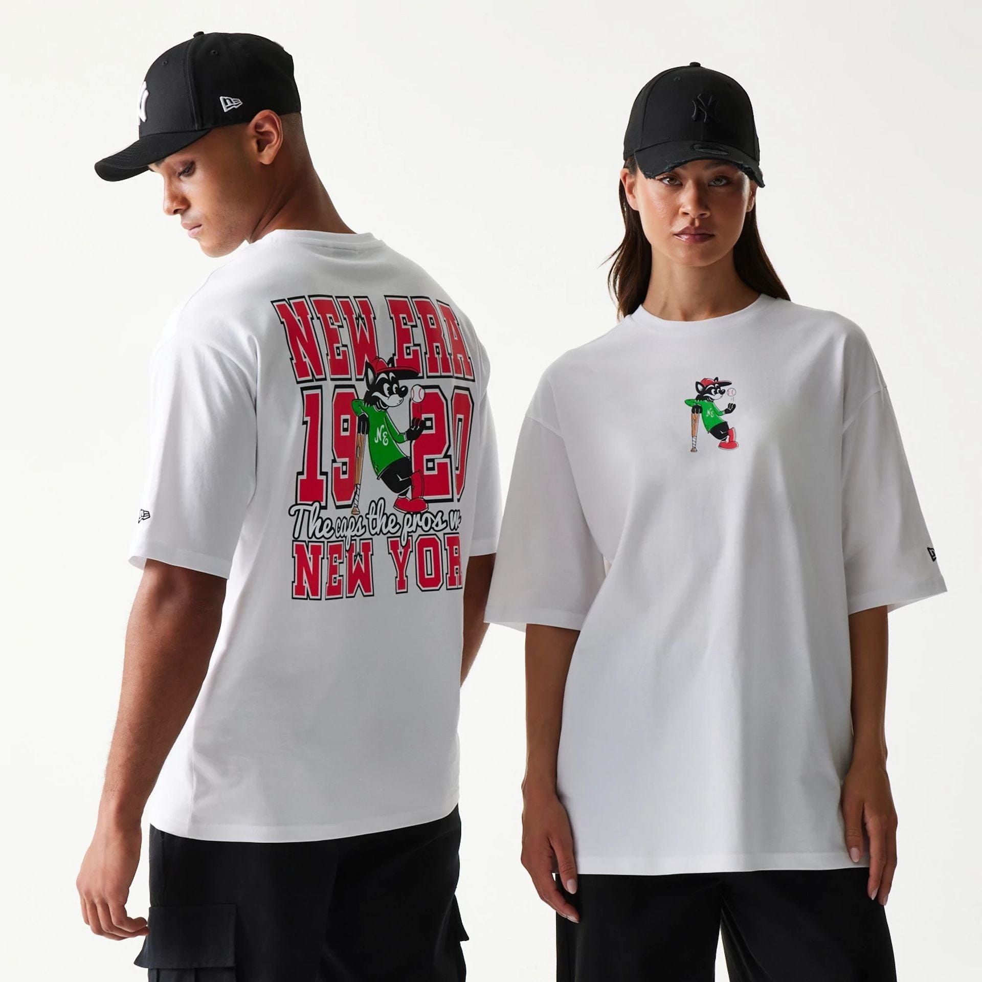 The model is wearing this New Era Baseball Cat Character Graphic Oversized T-Shirt in white. 1
