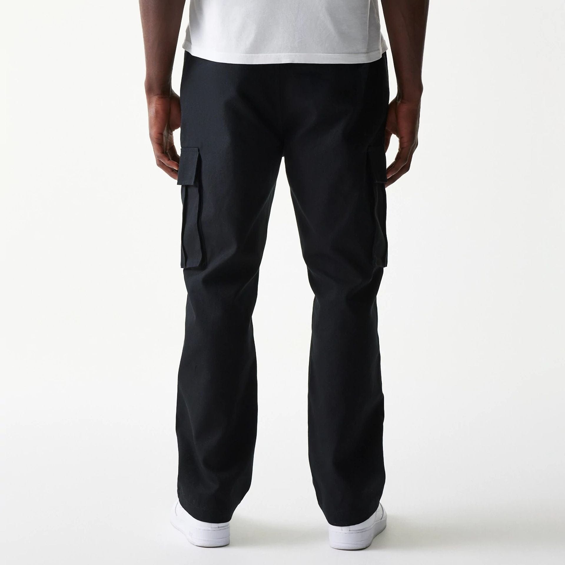 The model is wearing this New Era Straight Leg Cargo Joggers in black. 2