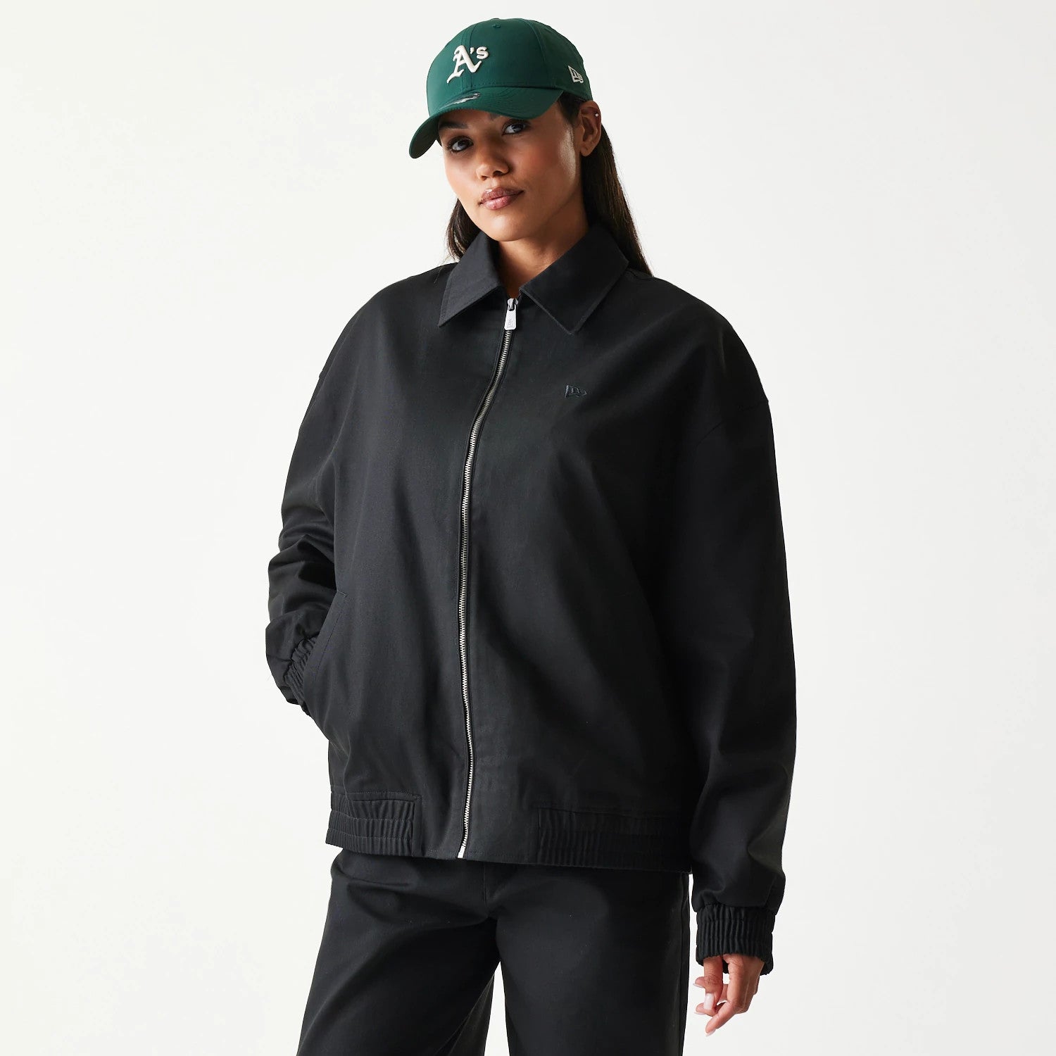 The model is wearing this New Era Collared Jacket in black. 4