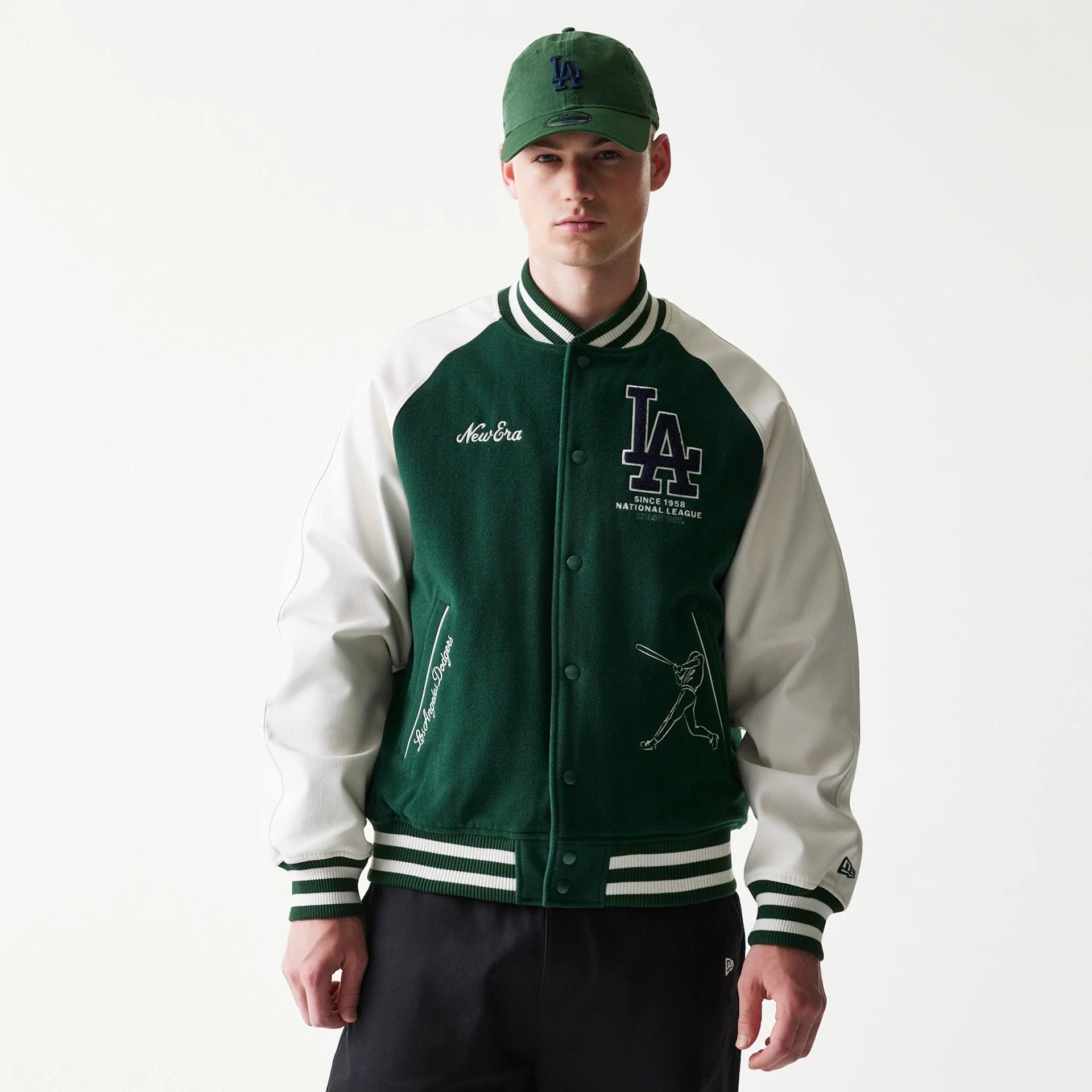 The model is wearing this MLB LA Dodgers Varsity Jacket in dark green. 1