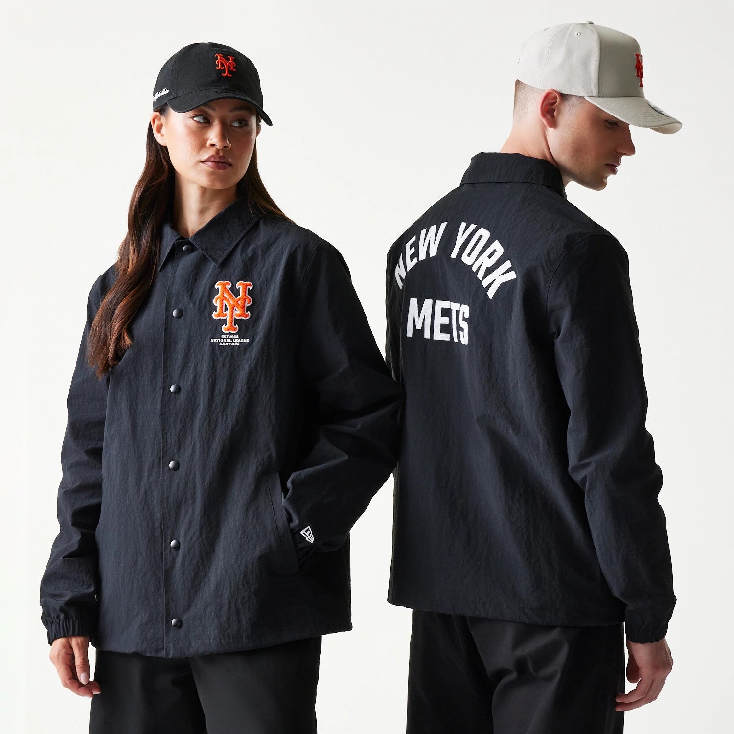 The model is wearing this MLB Coaches New York Mets Jacket in black. 1