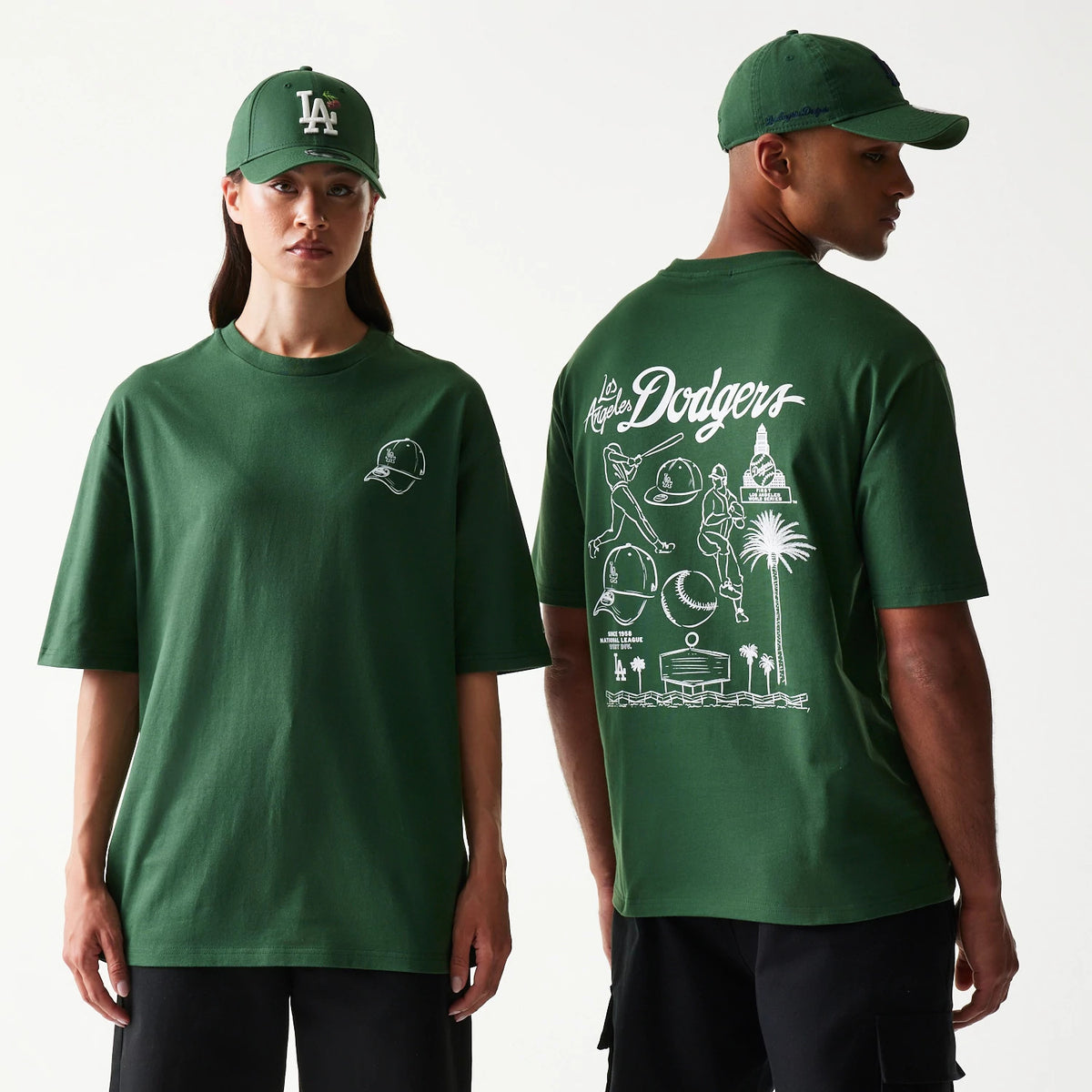 New Era LA Dodgers MLB Baseball Graphic Dark Green Oversized T-Shirt, front and back view on models showing a detailed white graphic and Dodgers lettering on the back, with a small cap illustration on the front left chest.