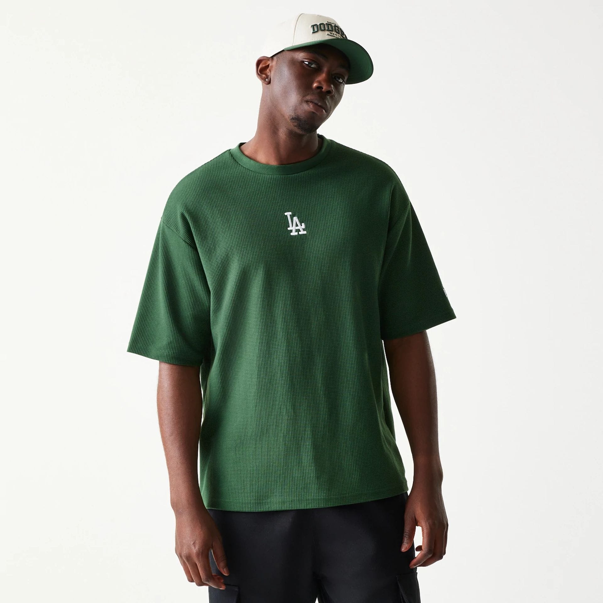 The model is wearing this MLB Waffle LA Dodgers Oversized T-Shirt in dark green. 1