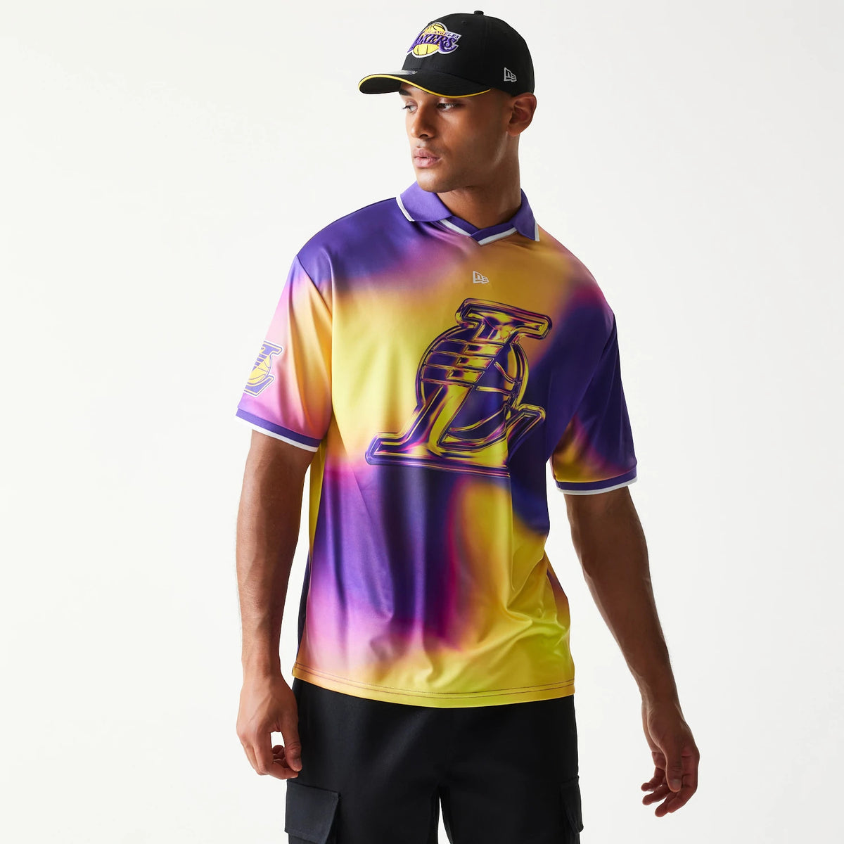 The model is wearing this NBA All Over Print LA Lakers T-Shirt in purple. 1