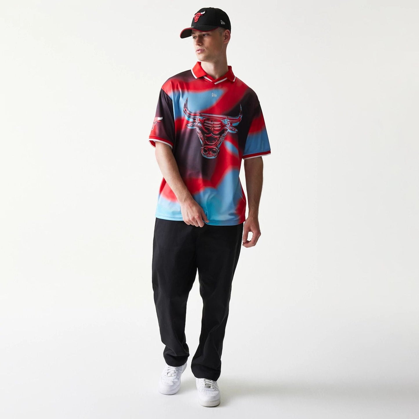 The model is wearing this NBA All Over Print Chicago Bulls T-Shirt in red. 8