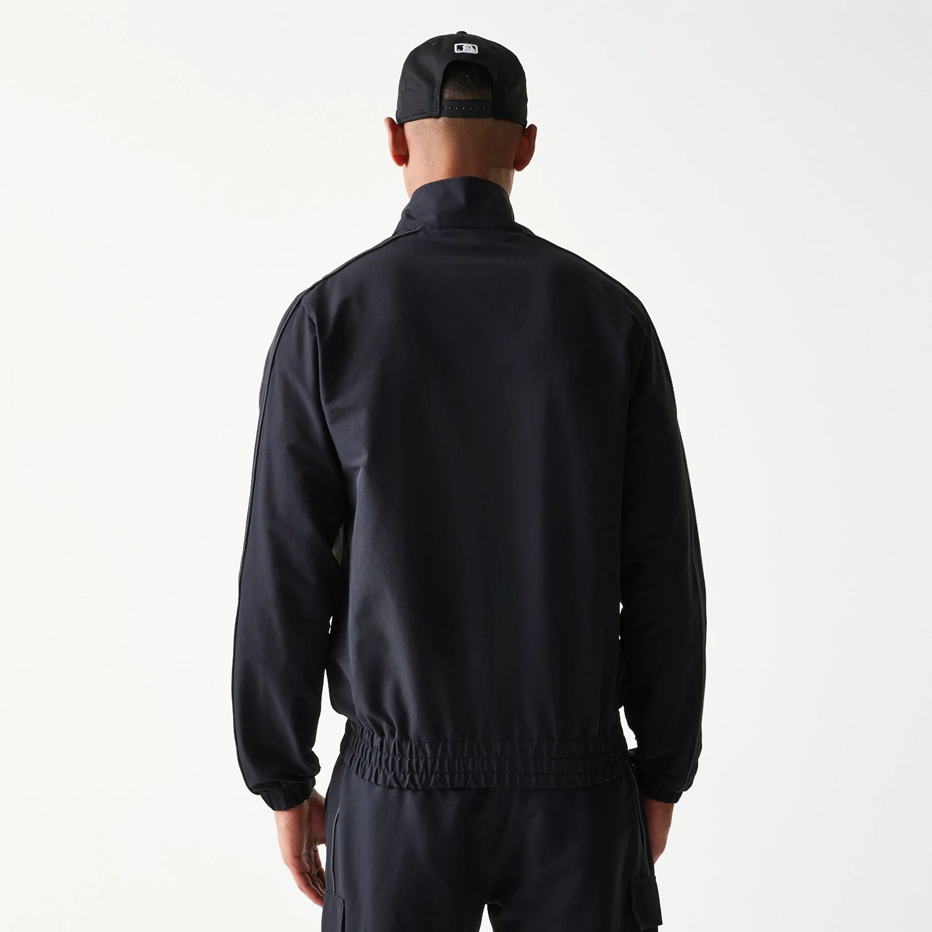 The model is wearing this MLB New York Yankees Jacket in black. 2