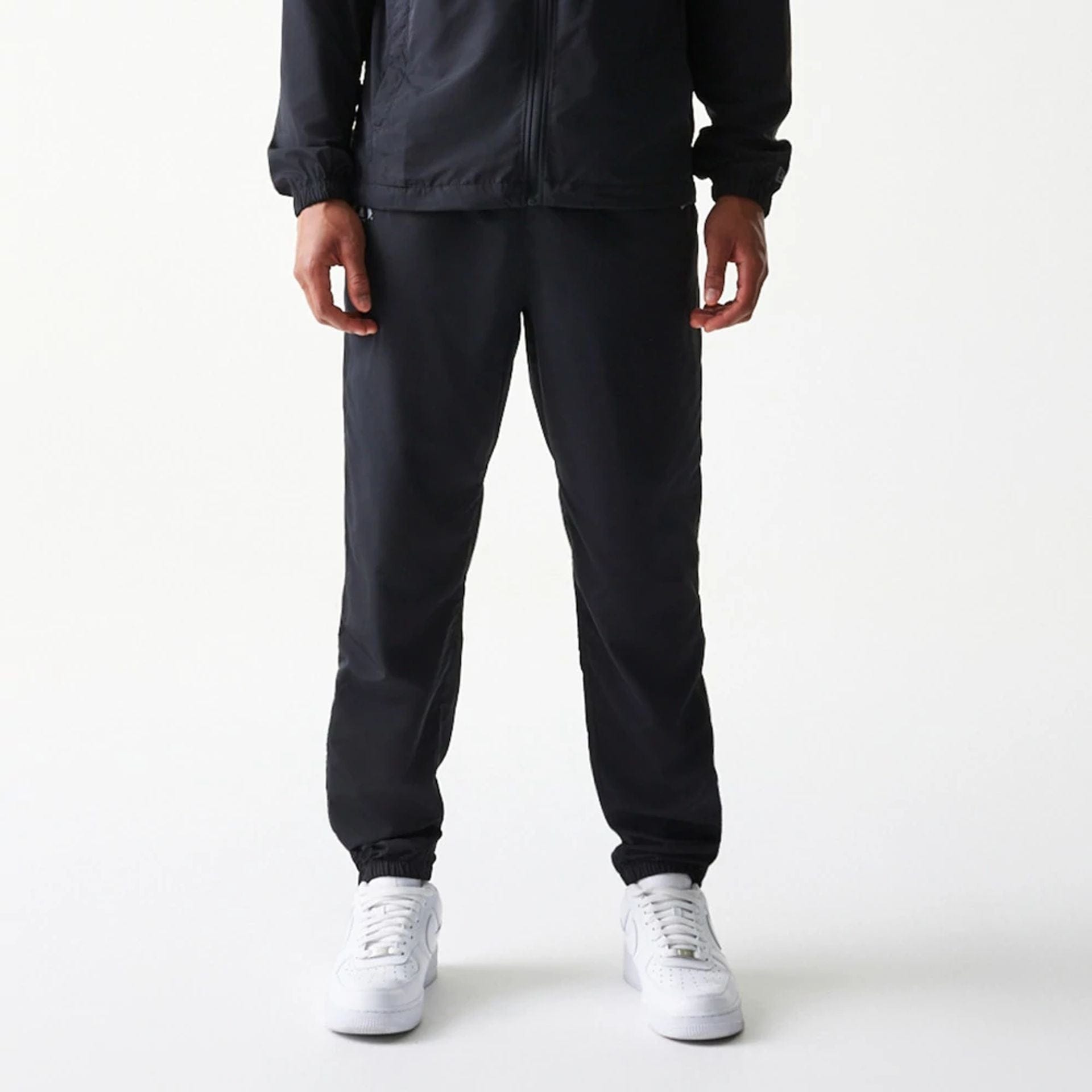 The model is wearing this MLB New York Yankees Track Pants in black. 1