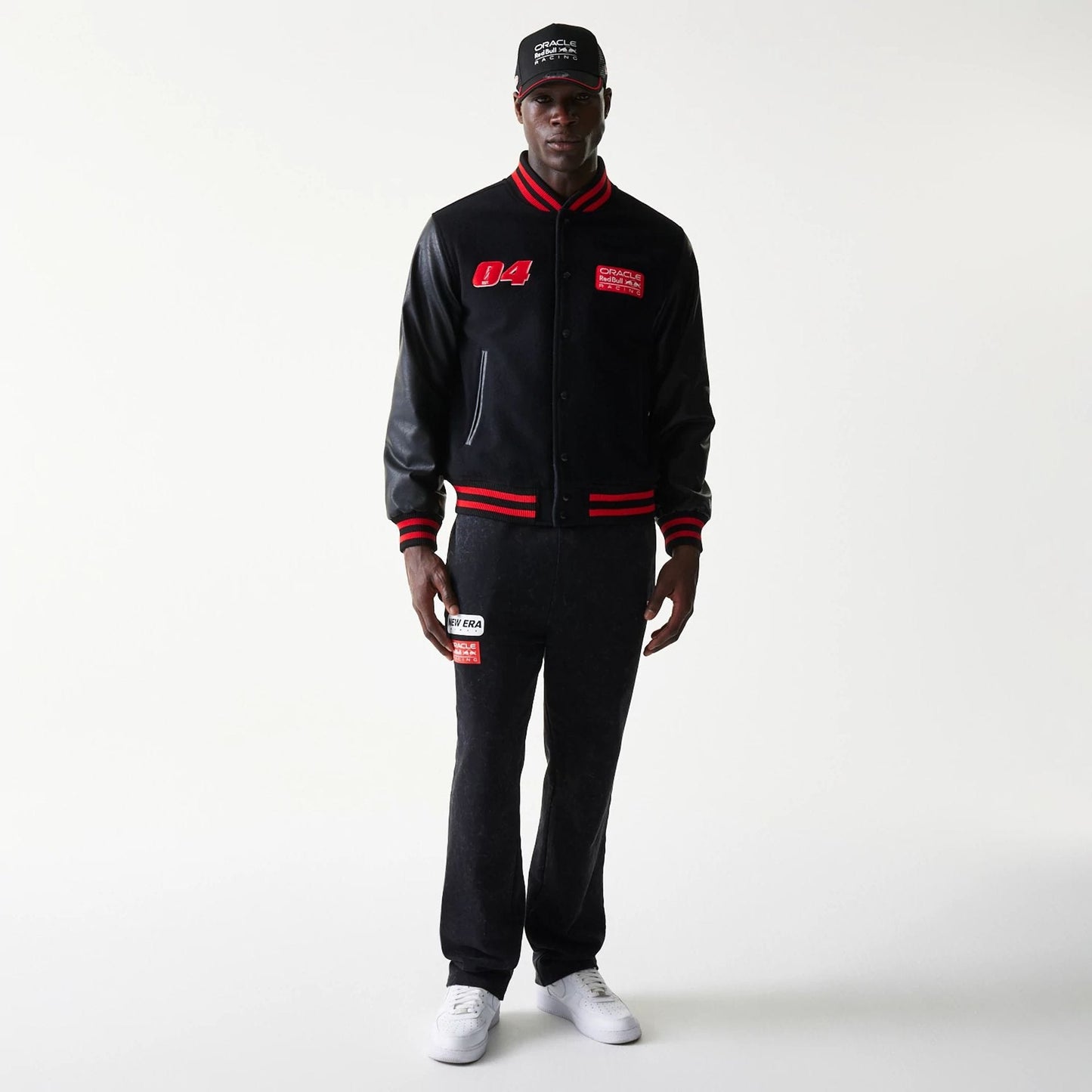 The model is wearing this Red Bull Racing Varsity Jacket in black. 8