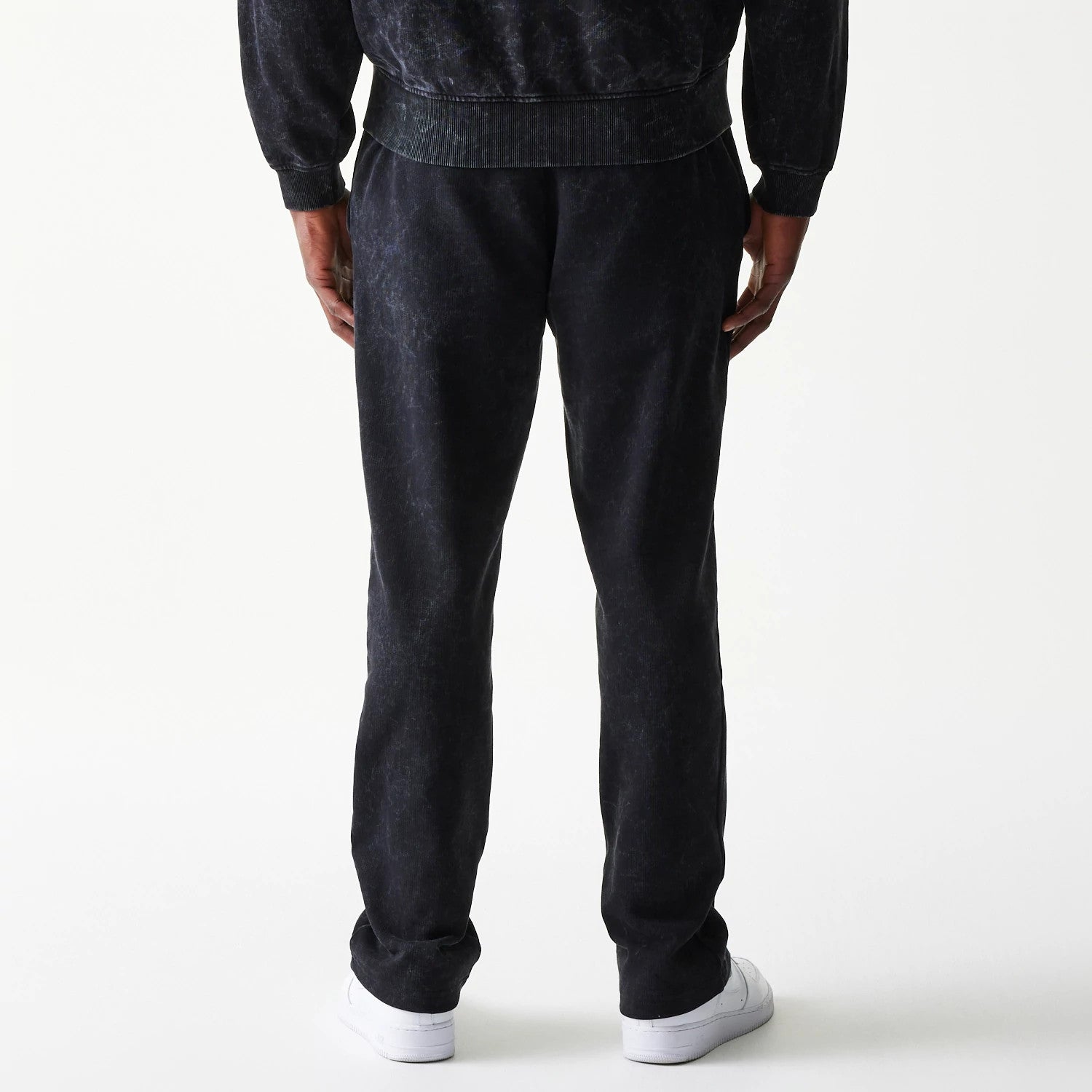 The model is wearing this Red Bull Racing Straight Leg Joggers in black. 2