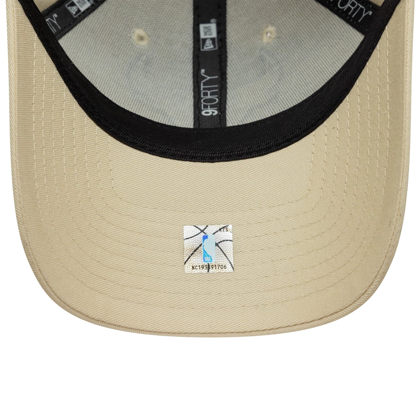 Chicago Bulls NBA Team Outline Light Beige New Era 9FORTY Cap, inside view showing a light beige sweatband, black taping with 9FORTY branding, and a black undervisor with an NBA holographic sticker.