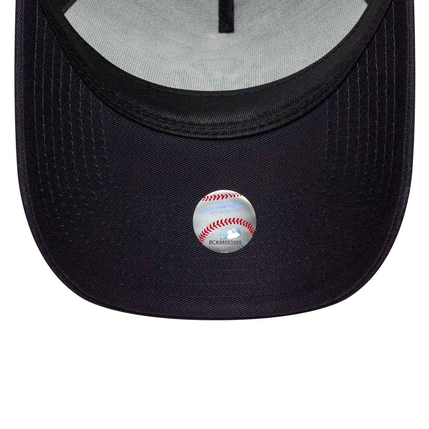 Pictured is this MLB Outline New York Yankees 9FORTY E-Frame Trucker in navy. 5