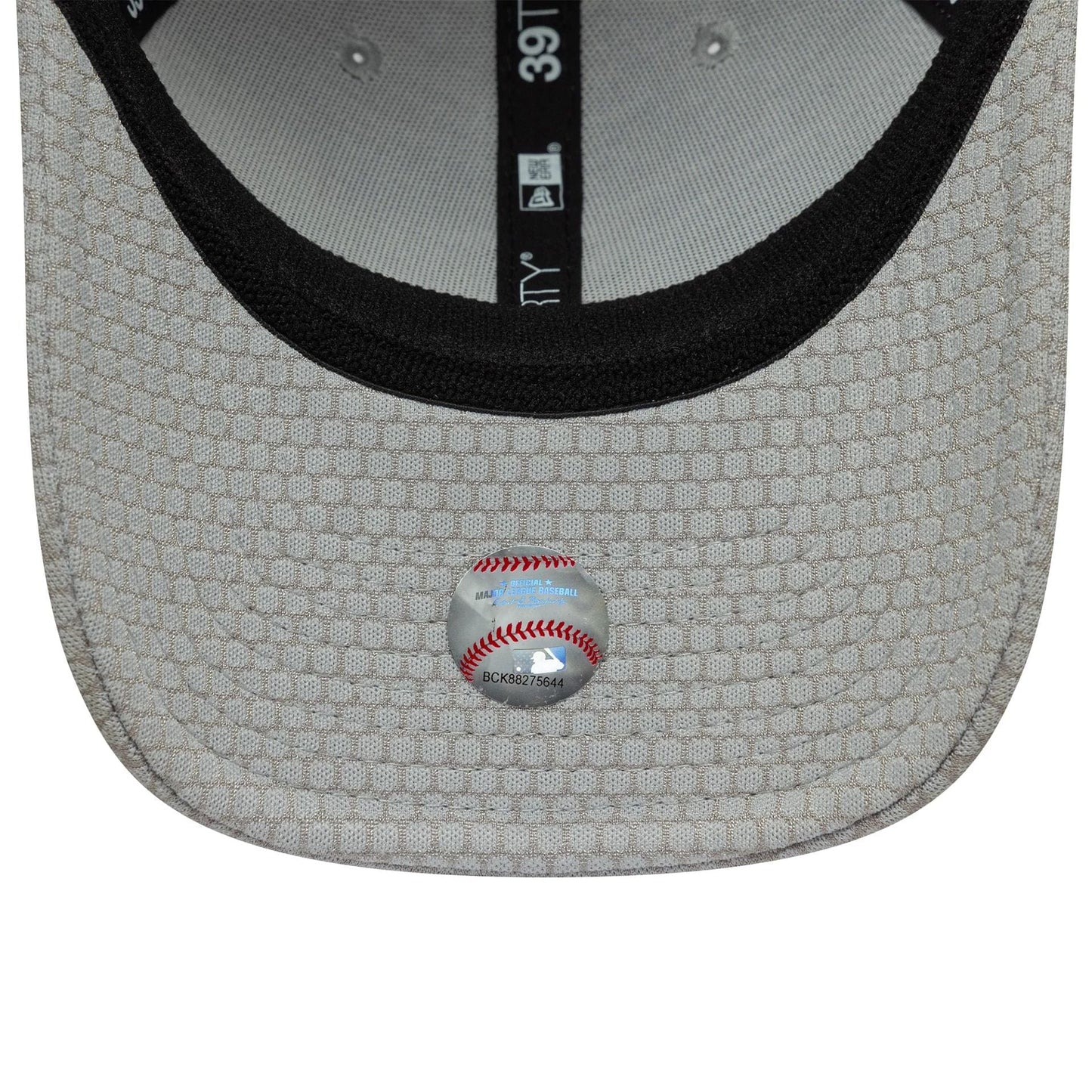 New York Yankees MLB Mesh Grey New Era 39THIRTY Stretch Fit Cap, inside view showing the grey mesh undervisor with a black sweatband, MLB holographic sticker on the visor, and New Era branding on the inner taping.
