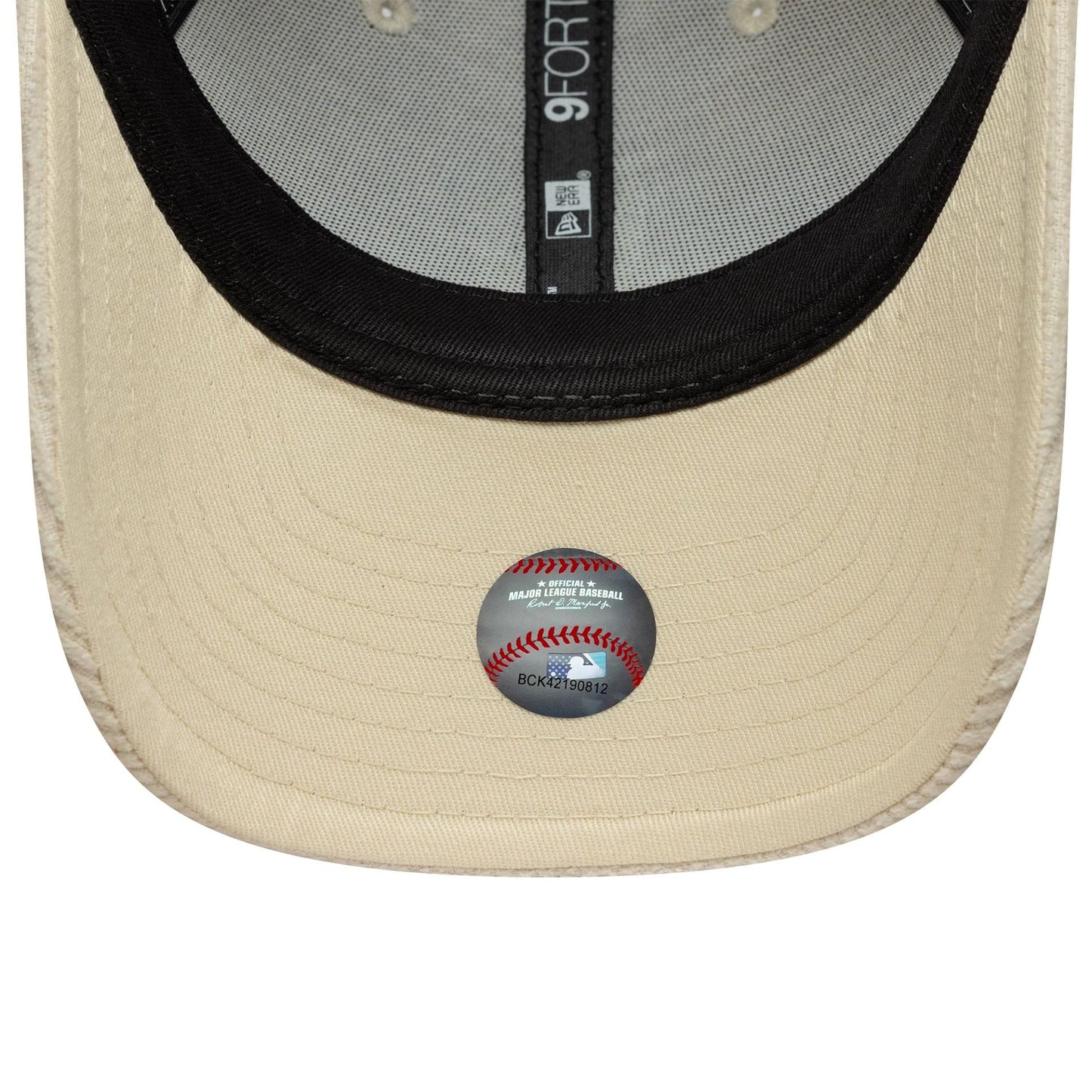 LA Dodgers Womens MLB Pastel Cord Light Beige New Era 9FORTY M-Crown Cap, inside view showing the MLB sticker centred on the light beige undervisor, with black sweatband, grey taping, and rear eyelets.