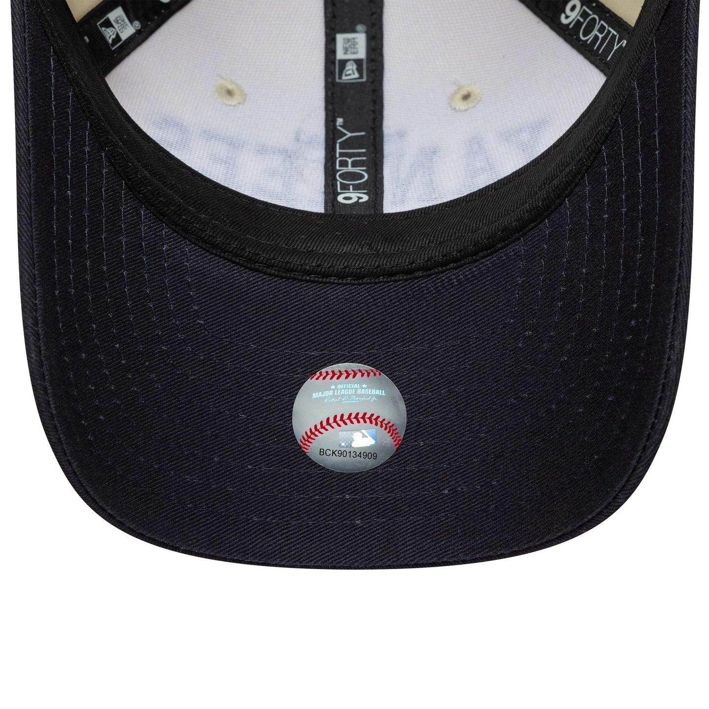 New York Yankees Youth MLB Wordmark Black New Era 9FORTY M-Crown Cap, inside view showing the black sweatband with white 9FORTY lettering, black taping, and a baseball-shaped authenticity sticker on the black undervisor.