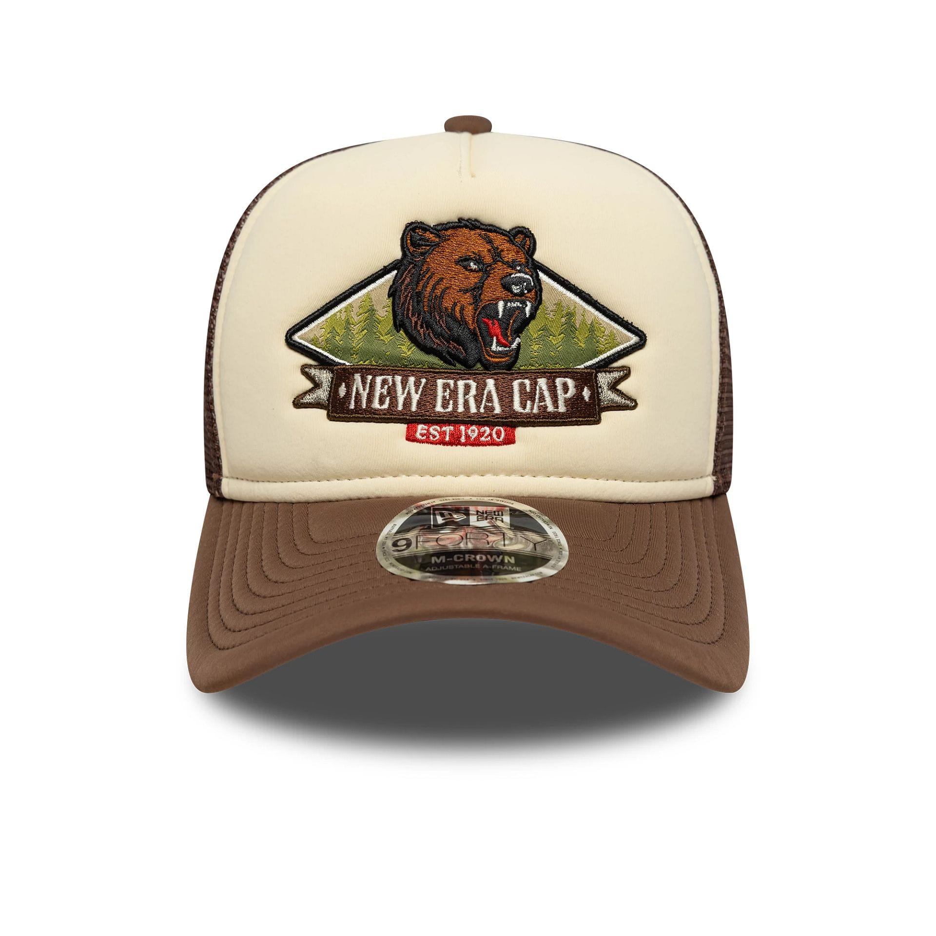 Pictured is this New Era Graphic 9FORTY M-Crown A-Frame Trucker in light beige. 2