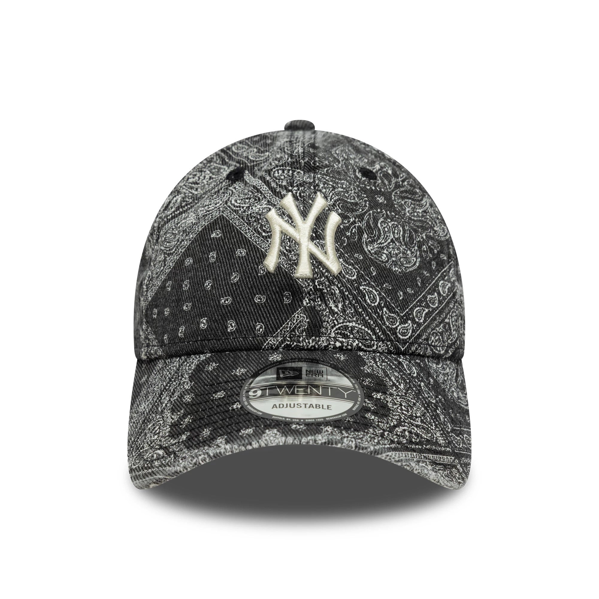 New York Yankees MLB Washed Paisley Black New Era 9TWENTY Cap, front view showing a raised white embroidered NY logo on the intricately patterned black paisley crown, with a 9TWENTY size sticker on the curved visor.