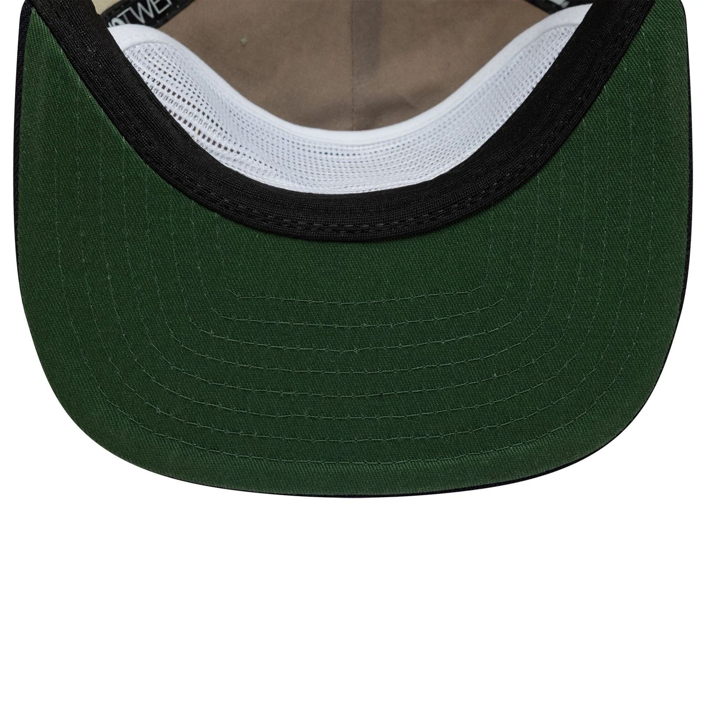 New Era Outdoor Graphic Light Beige 19TWENTY Adjustable Cap, inside view showing the dark green undervisor with curved stitching, brown sweatband, white interior mesh, and New Era branded taping.