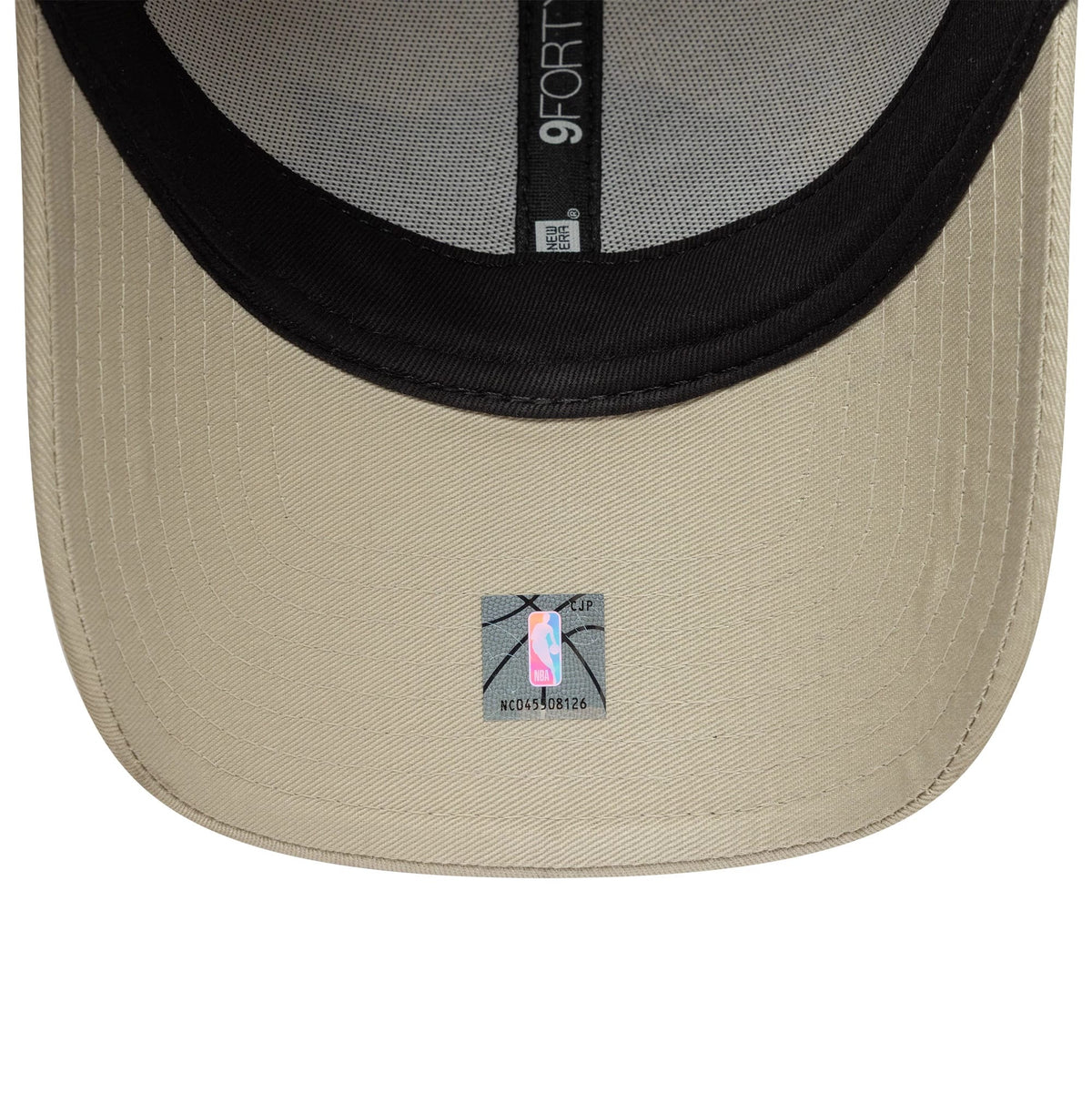 LA Lakers NBA Metallic Light Beige New Era 9FORTY Cap, inside view showing the black interior taping with New Era branding, a grey sweatband, and a NBA holographic sticker on the beige undervisor.