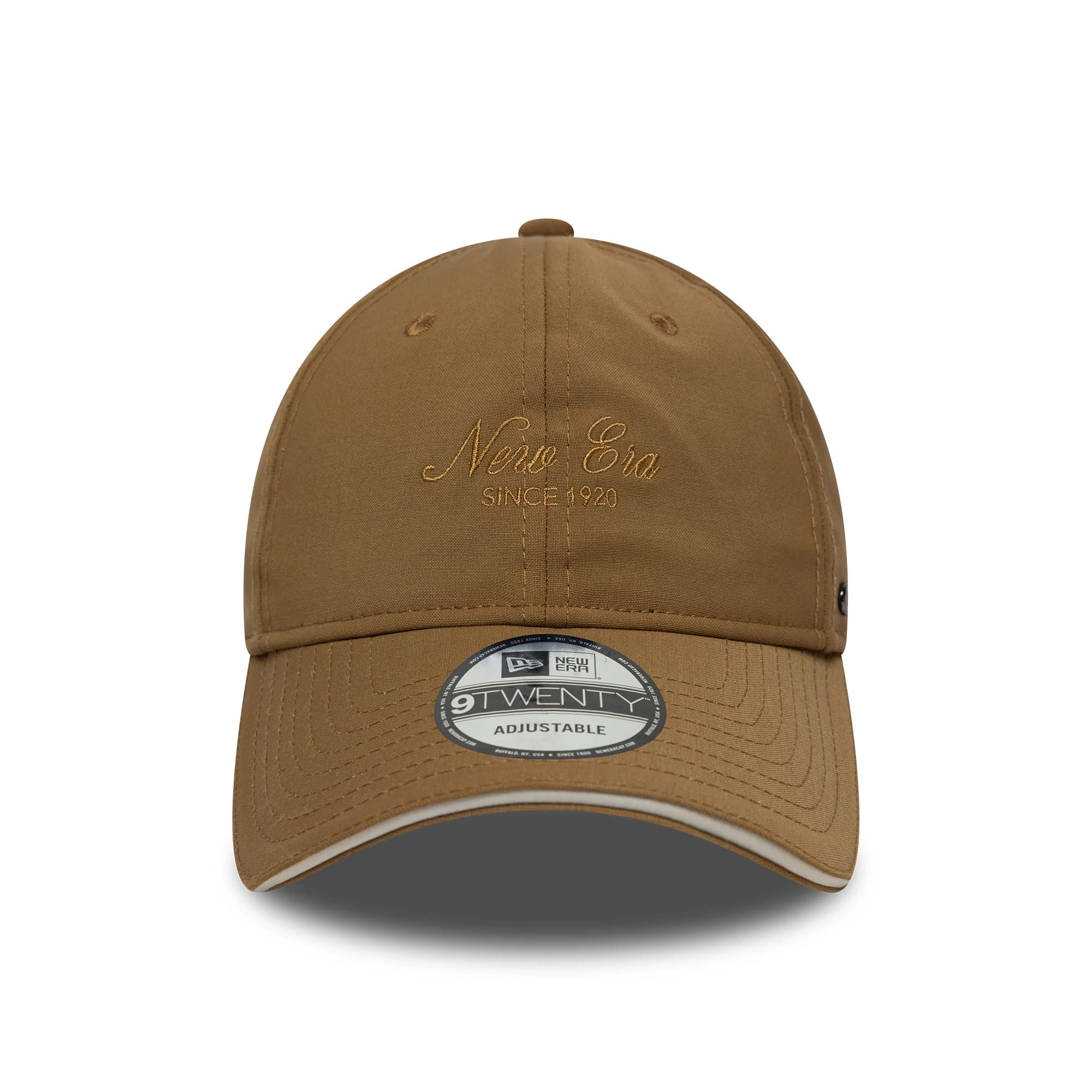 New Era Heritage Light Beige New Era 9TWENTY Cap, front view showing embroidered New Era script and Since 1920 on the structured crown, with a curved visor featuring a 9TWENTY size sticker and contrasting white undervisor edge.