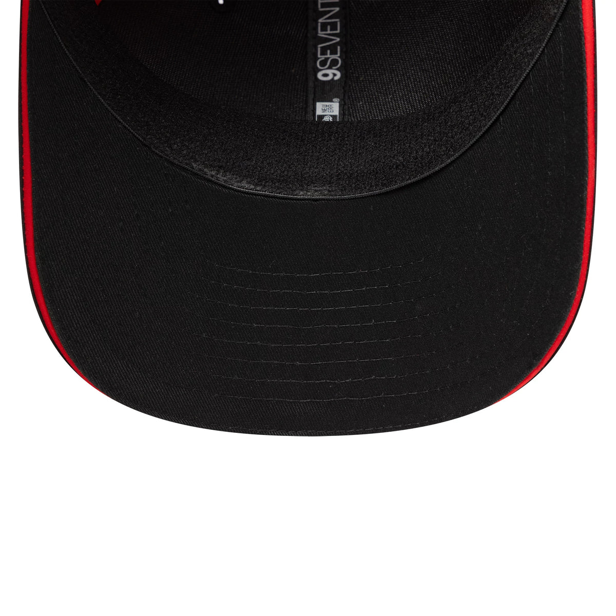 Ducati Motor Logo Print Black New Era 9SEVENTY Stretch Snap Cap, inside view showing the black segmented undervisor, red accent along the edge, black sweatband, and the New Era taping along the seam.