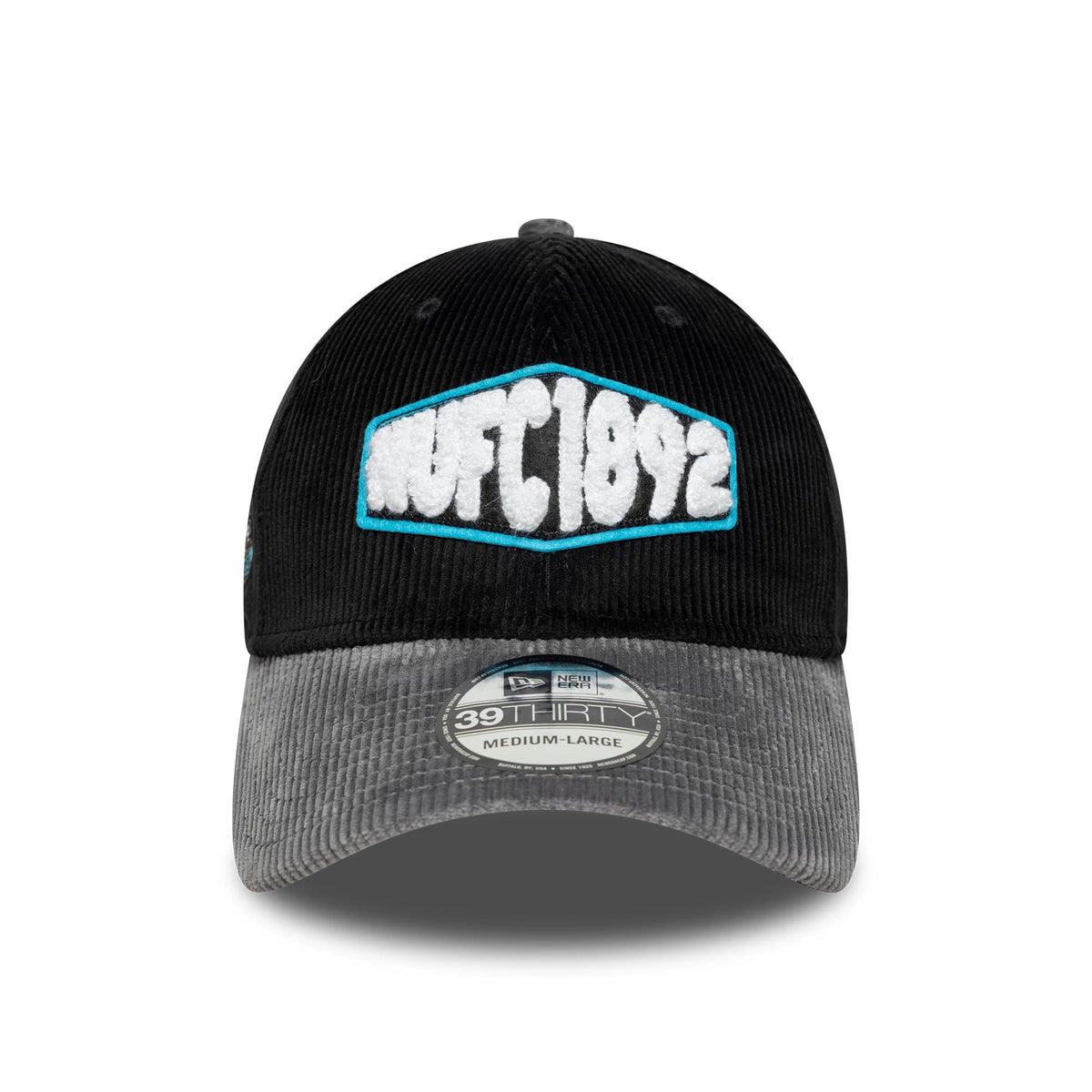 Newcastle United FC Cord Black New Era 39THIRTY Stretch Fit Cap, front view showing a textured NUFC 1892 logo with white and blue embroidery on the structured black crown, complemented by a grey corduroy visor with a 39THIRTY size sticker.