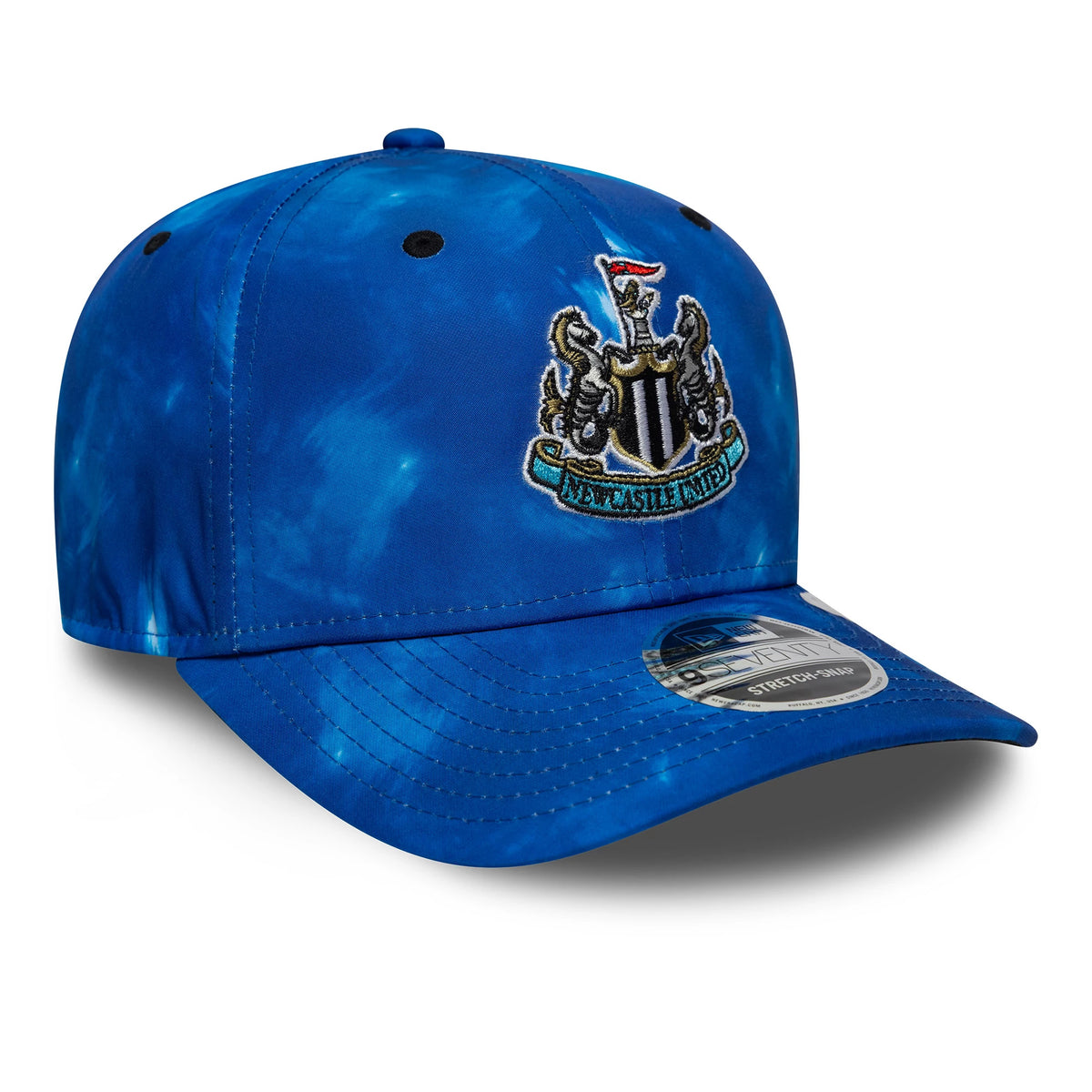 Newcastle United FC 1993 Open Blue New Era 9SEVENTY Stretch Snap Cap, three-quarter view showing the raised embroidered Newcastle United crest on the structured blue crown, with a curved visor featuring the 9SEVENTY size sticker.
