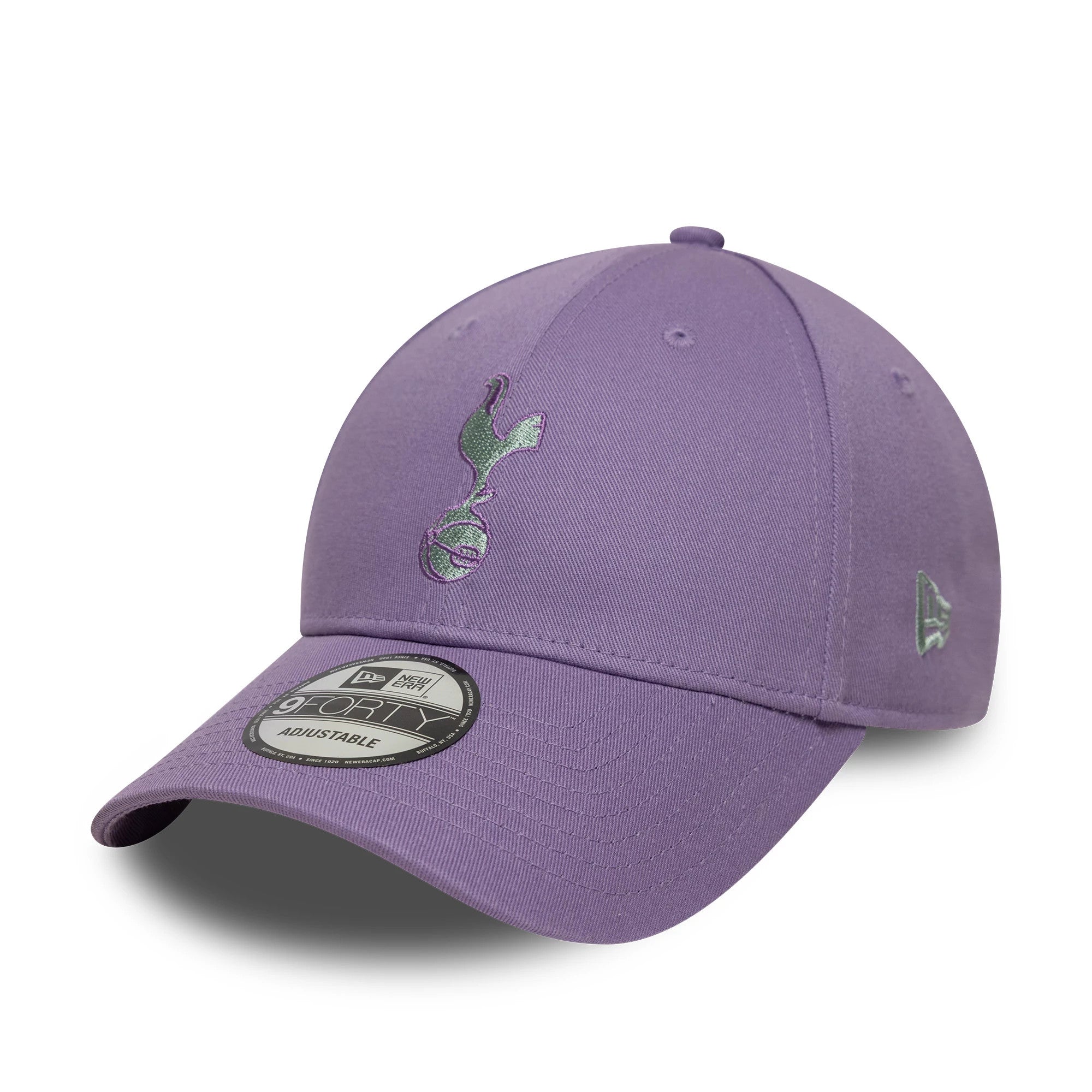 Tottenham Hotspur FC Pastel Purple New Era 9FORTY Adjustable Cap, three-quarter view showing a grey raised embroidered cockerel logo on the front panel, a matching New Era flag logo on the left side.