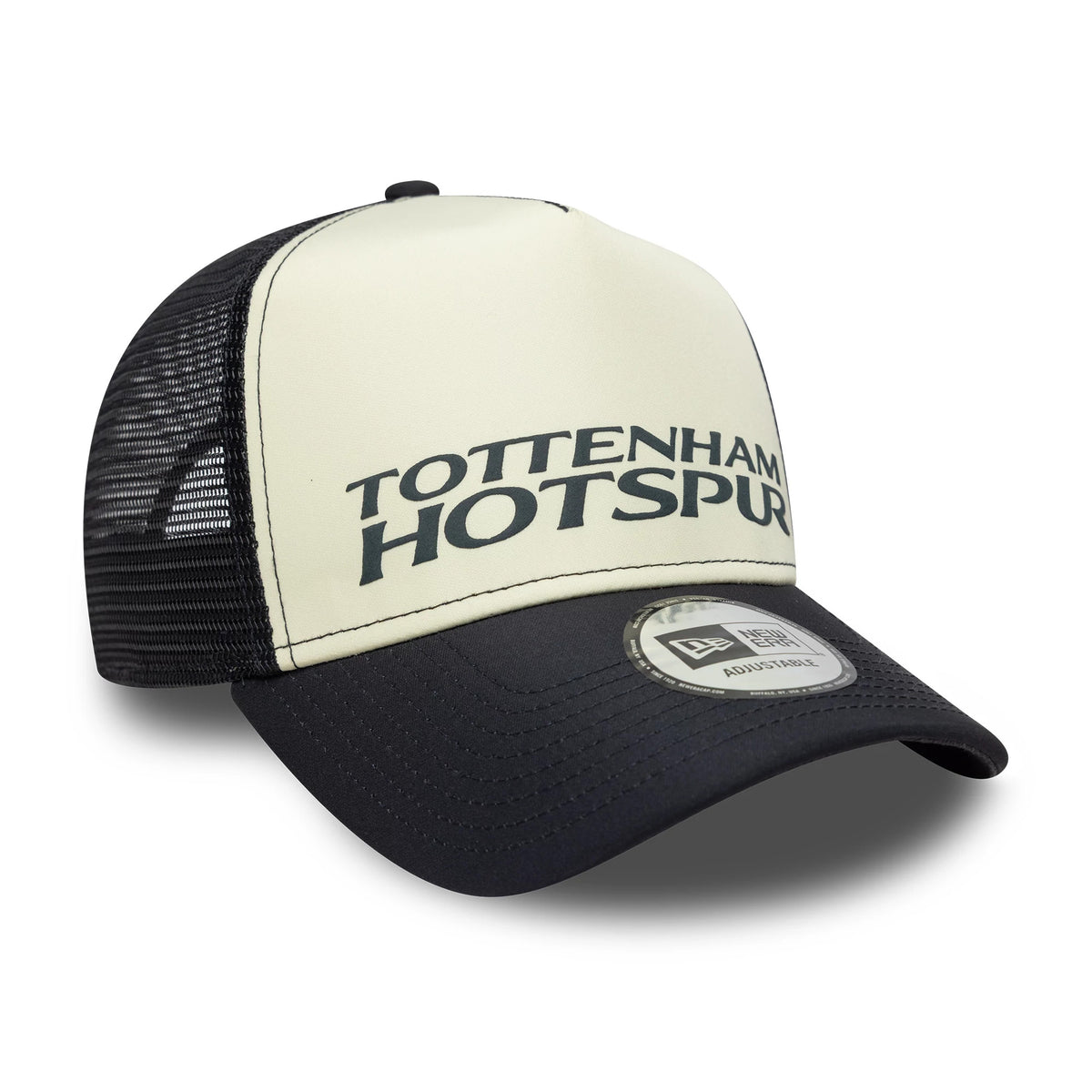 Tottenham Hotspur FC Puff Wordmark Navy New Era 9FORTY A-Frame Trucker Cap, three-quarter view showing the dark puff embroidery of the Tottenham Hotspur wordmark on the structured front panel, with a black mesh rear.