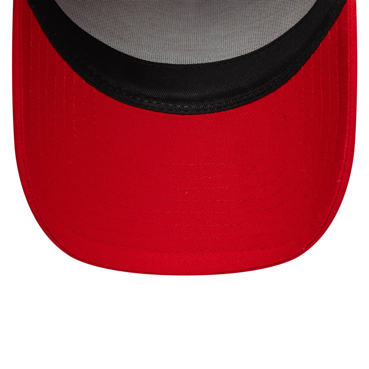 Ducati Corse Logo Red New Era 9FORTY E-Frame Trucker Cap, inside view showing the black sweatband and white mesh lining under the structured red visor, highlighting the stitching details.